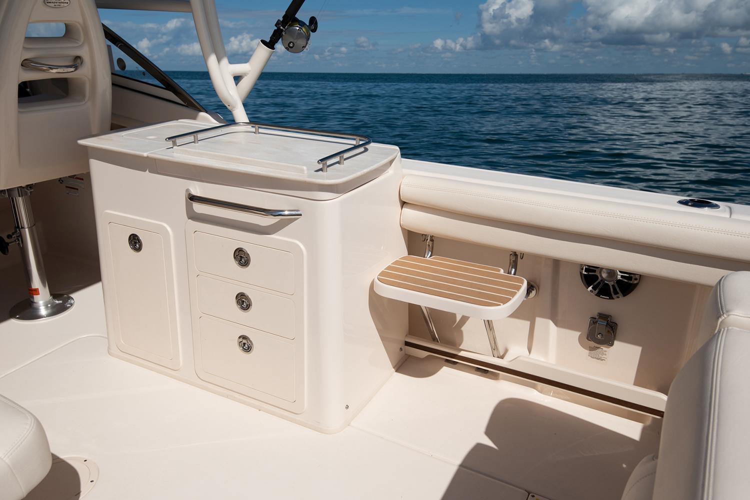 Manufacturer Provided Image: 2023 Grady-White Freedom 275 boat interior with storage and seating.