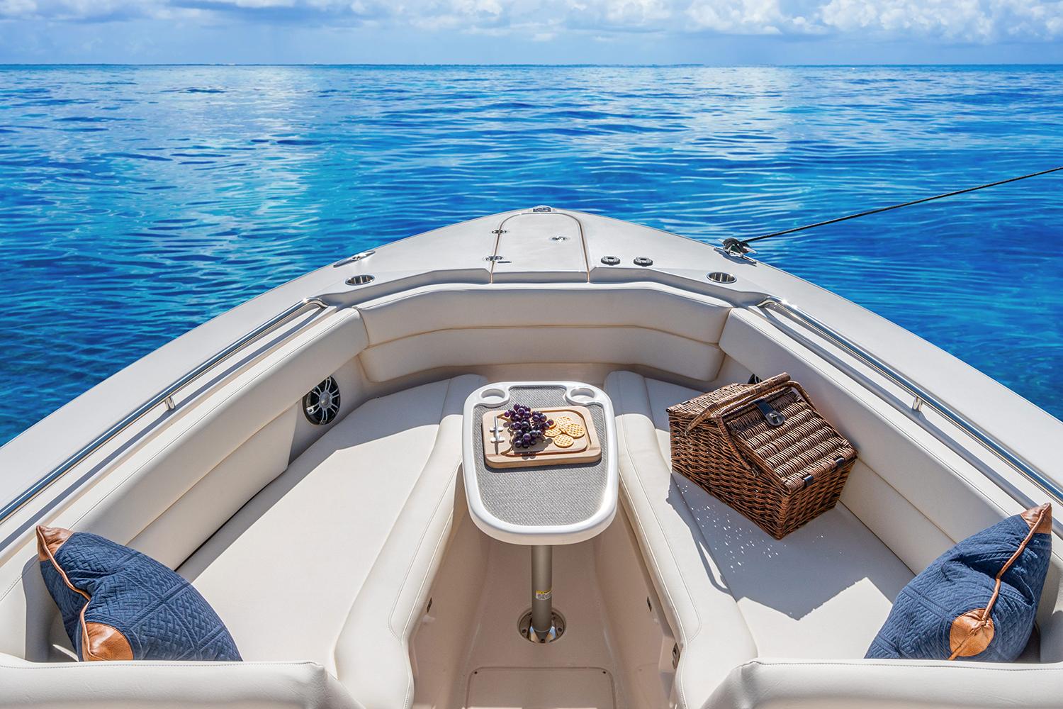 Manufacturer Provided Image: Luxury seating area on 2023 Grady-White Freedom 307 boat with ocean view.