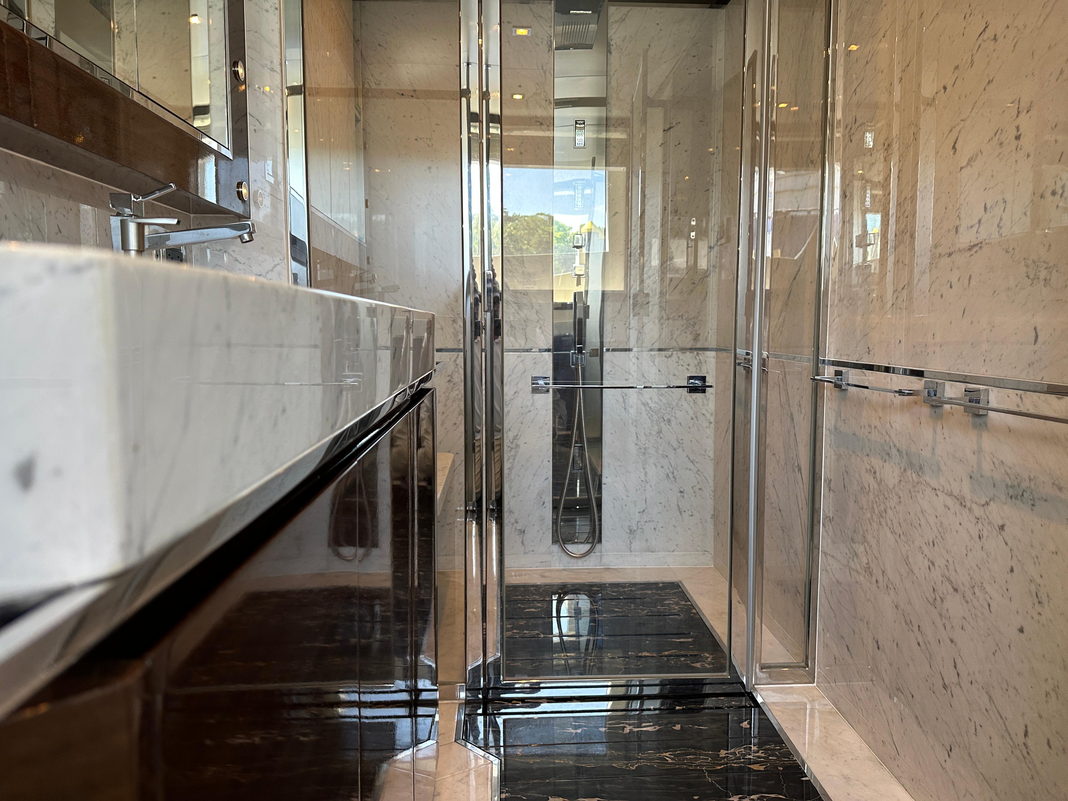 Cheoy Lee-Alpha 87 Express Sportbridge 2014-BBELLA FL-US-Luxurious marble bathroom in 2014 Cheoy Lee Alpha 87 Express Sportbridge yacht.-9807207 | Thumbnail