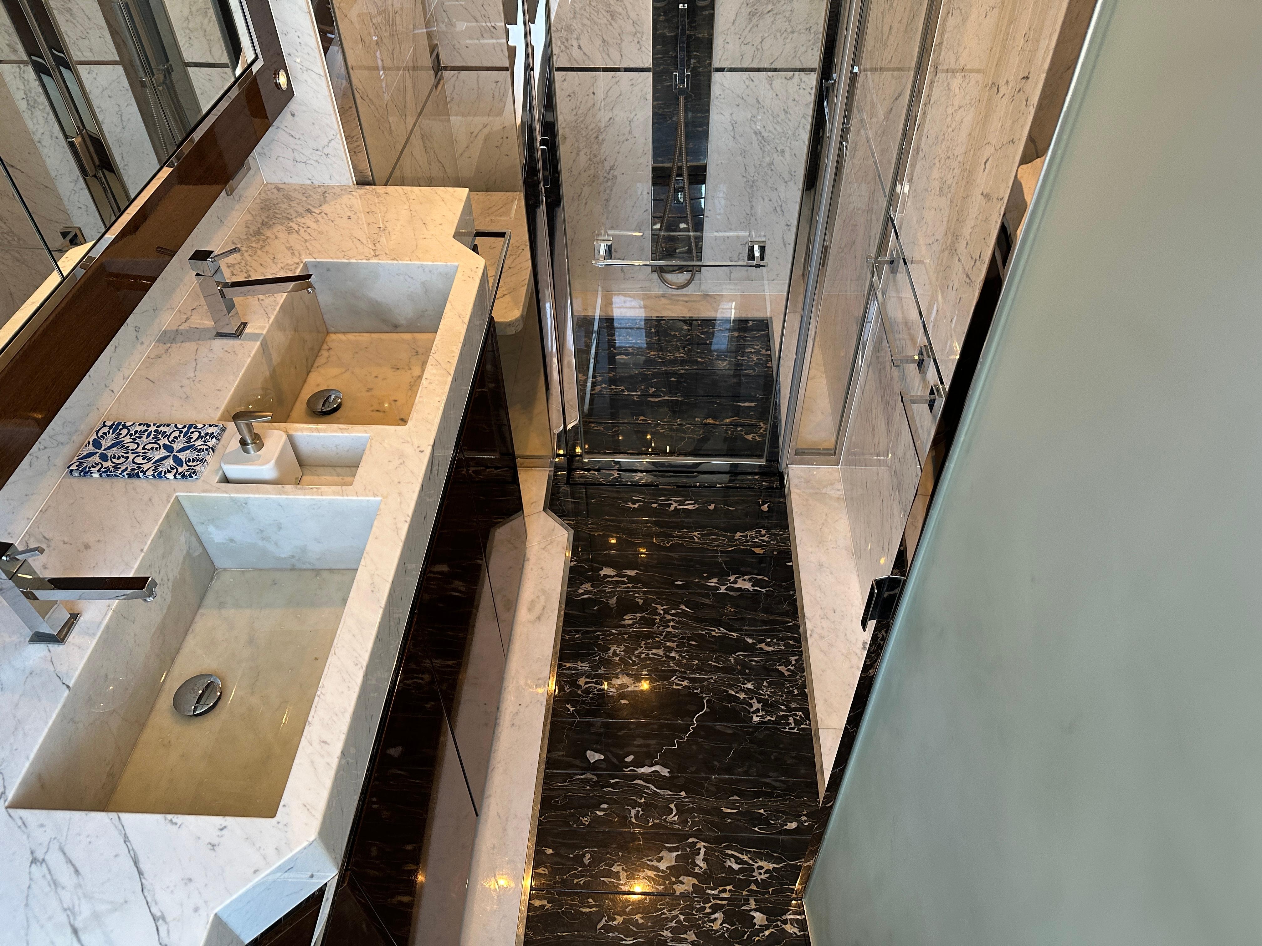 Cheoy Lee-Alpha 87 Express Sportbridge 2014-BBELLA FL-US-Luxurious bathroom in 2014 Cheoy Lee Alpha 87 Express Sportbridge yacht with marble finishes.-9807207 | Thumbnail