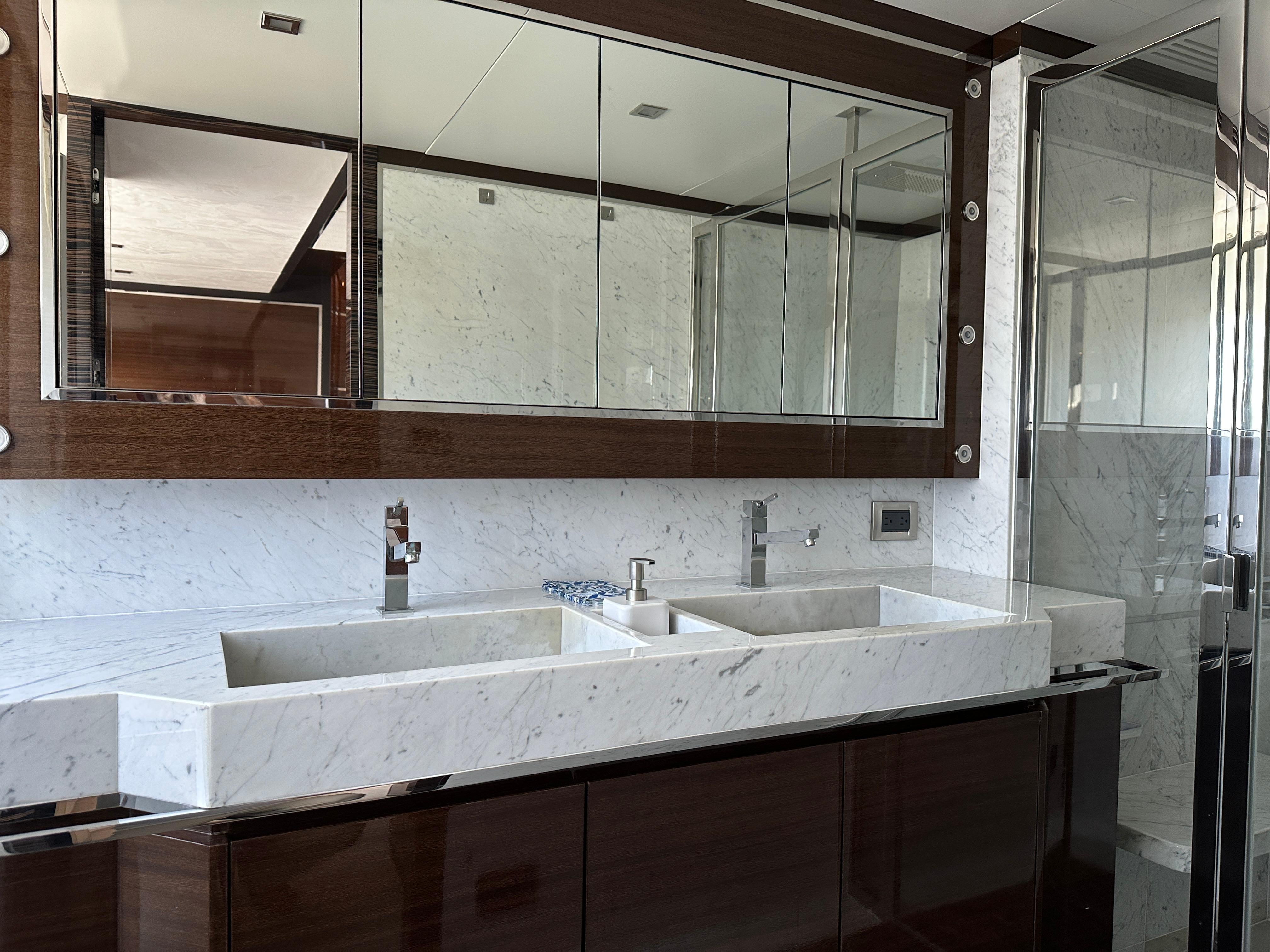 Cheoy Lee-Alpha 87 Express Sportbridge 2014-BBELLA FL-US-Luxurious bathroom with dual sinks and marble accents on a 2014 Cheoy Lee Alpha 87 Express Sportbridge.-9807207 | Thumbnail
