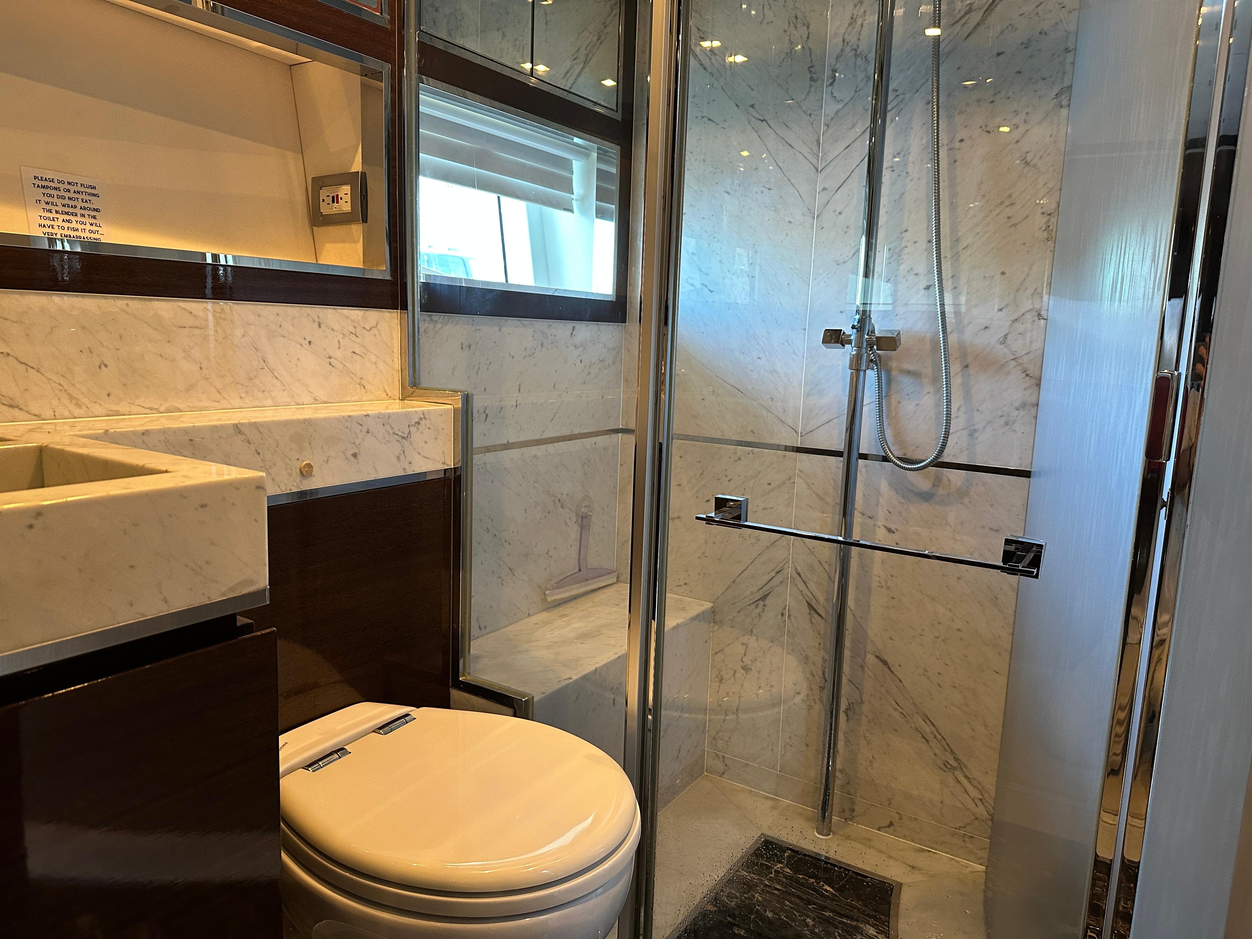Cheoy Lee-Alpha 87 Express Sportbridge 2014-BBELLA FL-US-Luxurious bathroom in 2014 Cheoy Lee Alpha 87 Express Sportbridge yacht with marble finishes.-9807207 | Thumbnail