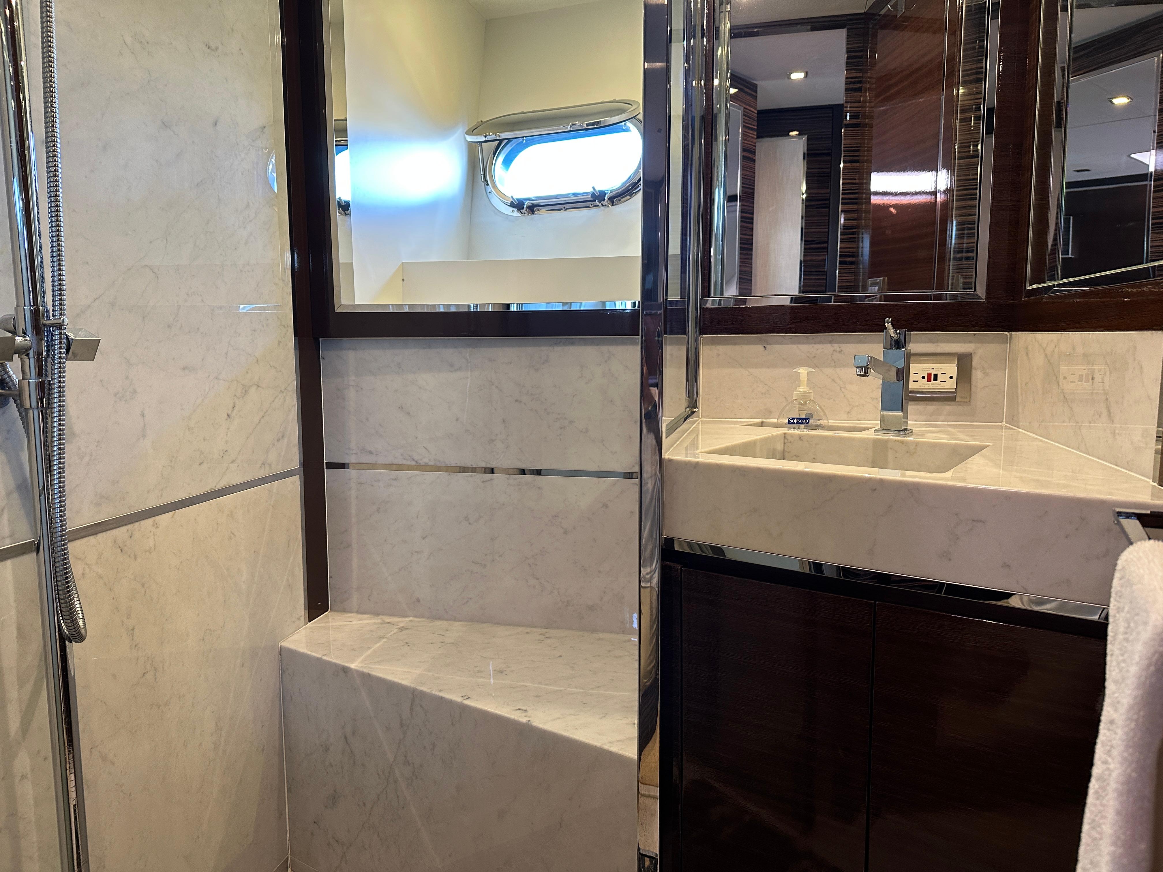 Cheoy Lee-Alpha 87 Express Sportbridge 2014-BBELLA FL-US-Luxurious bathroom in 2014 Cheoy Lee Alpha 87 Express Sportbridge yacht with marble finishes.-9807207 | Thumbnail