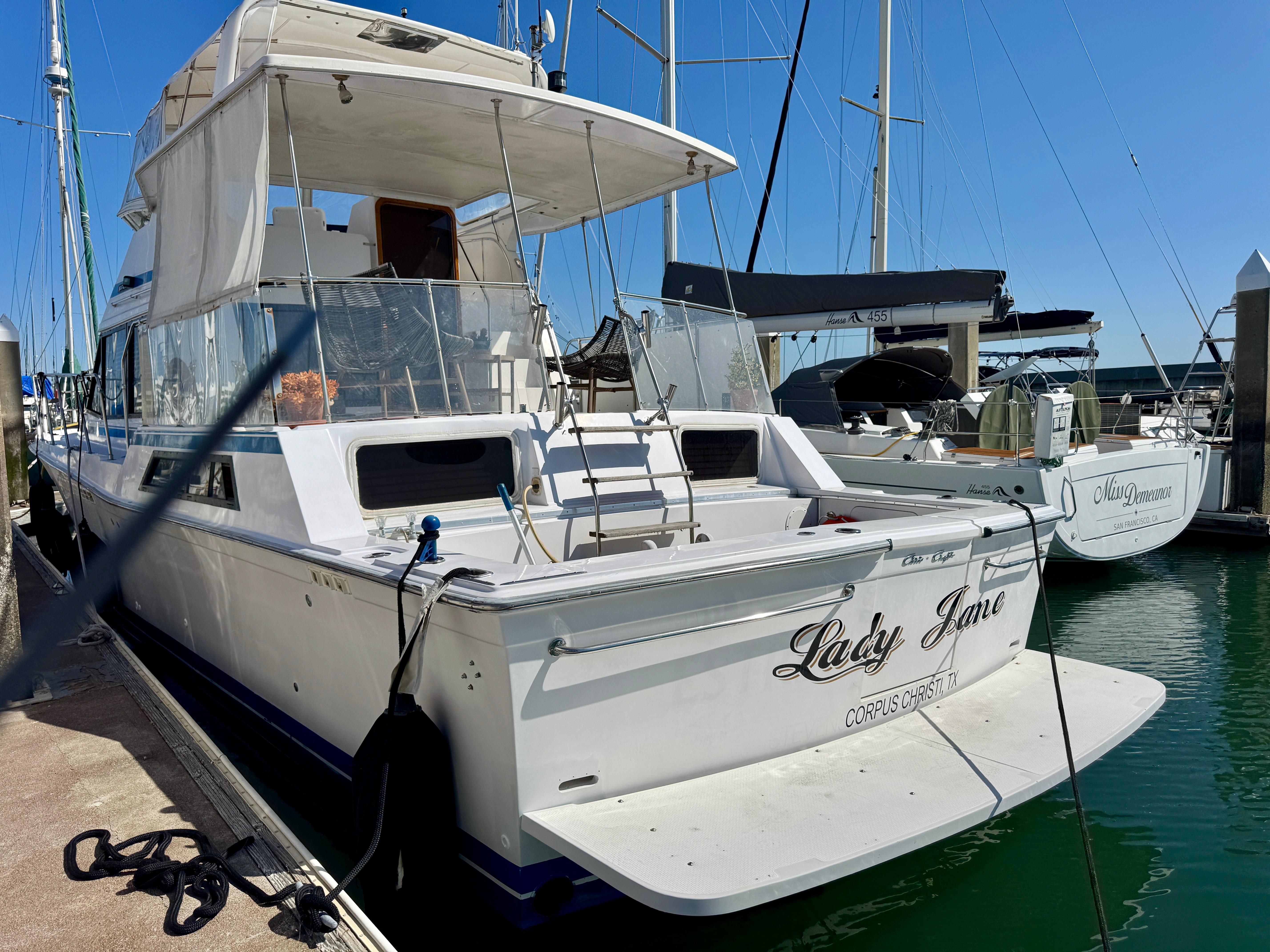 1989 Chris-Craft Catalina boat named "Lady Jane" docked at a marina, Corpus Christi, Texas.