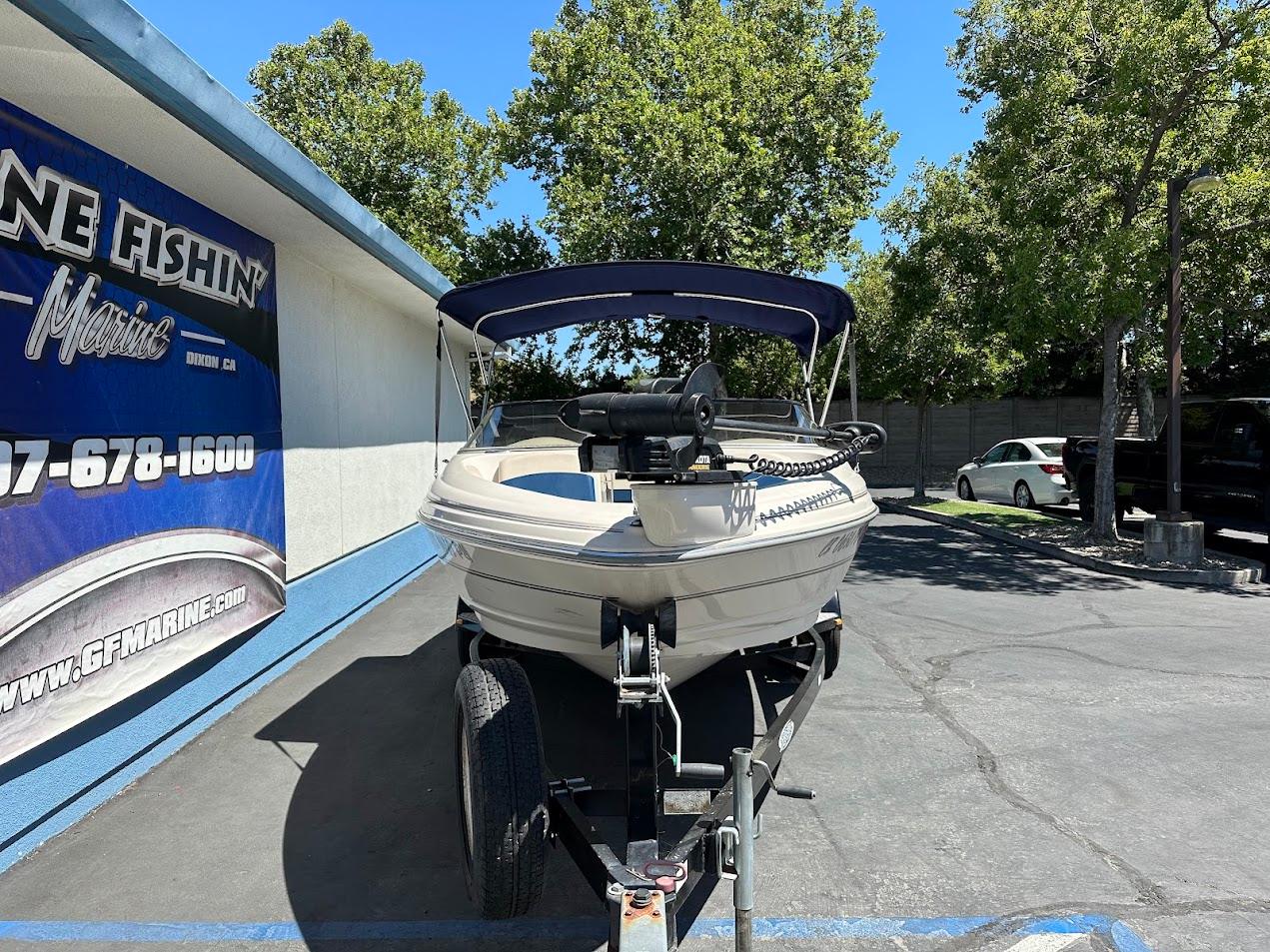 2001 Larson SEi 190 boat on trailer at GF Marine dealership.