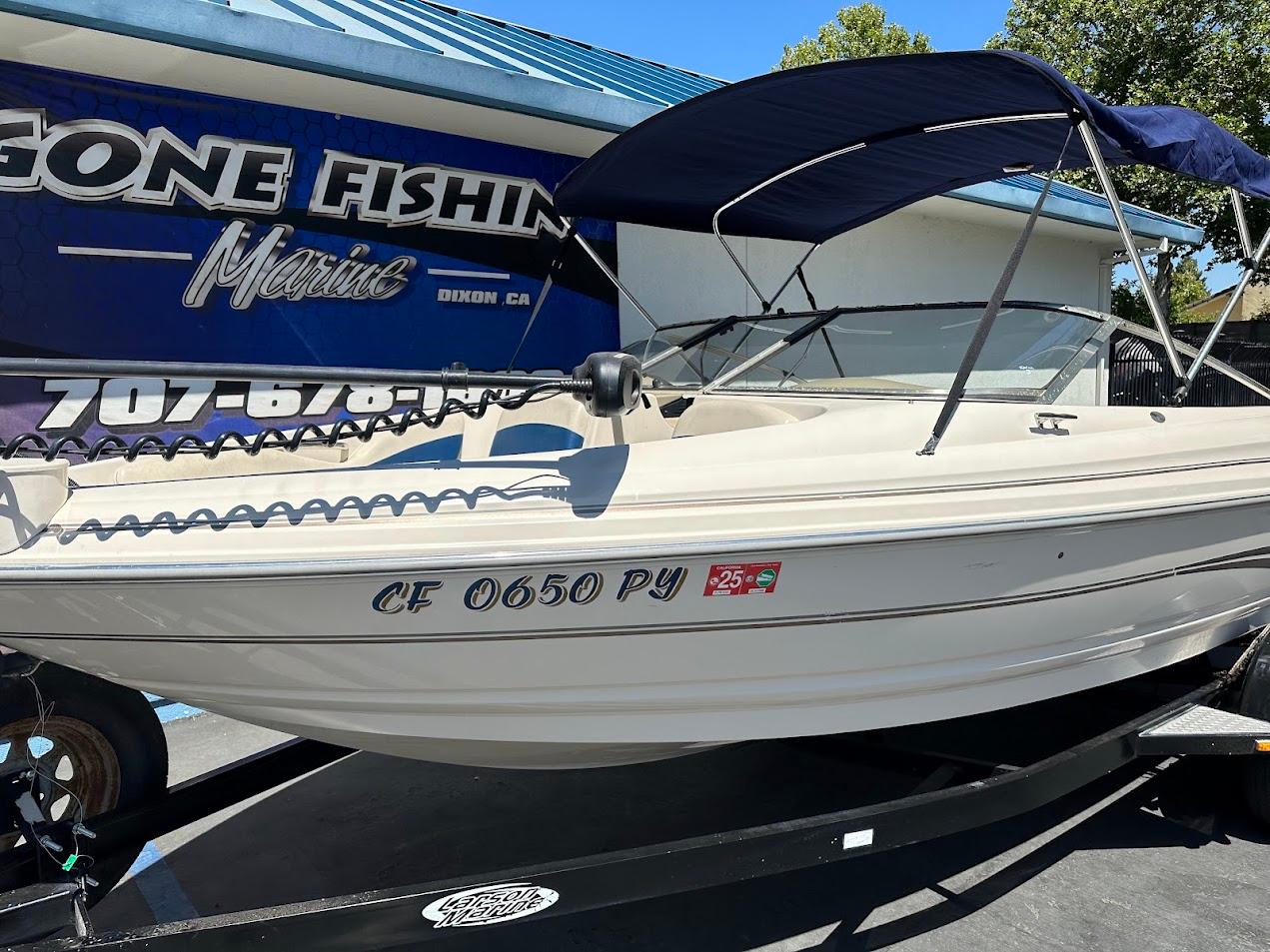 2001 Larson SEi 190 boat with canopy, displayed at Gone Fishing Marine.