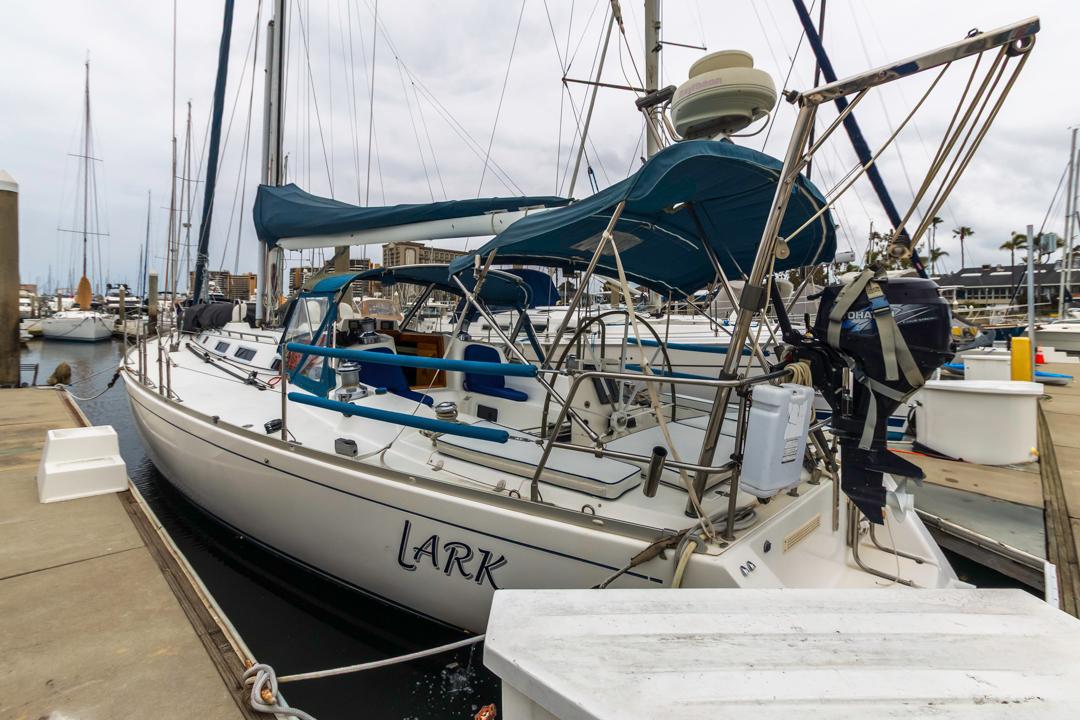 J Boats-46 2001-Lark US-2001 J Boats 46 sailboat docked at marina with blue canopy and equipment.-9774775 | Thumbnail