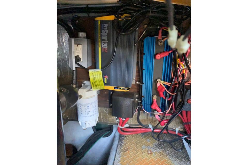 Electrical components and wiring inside a 1995 Regal 402 boat.