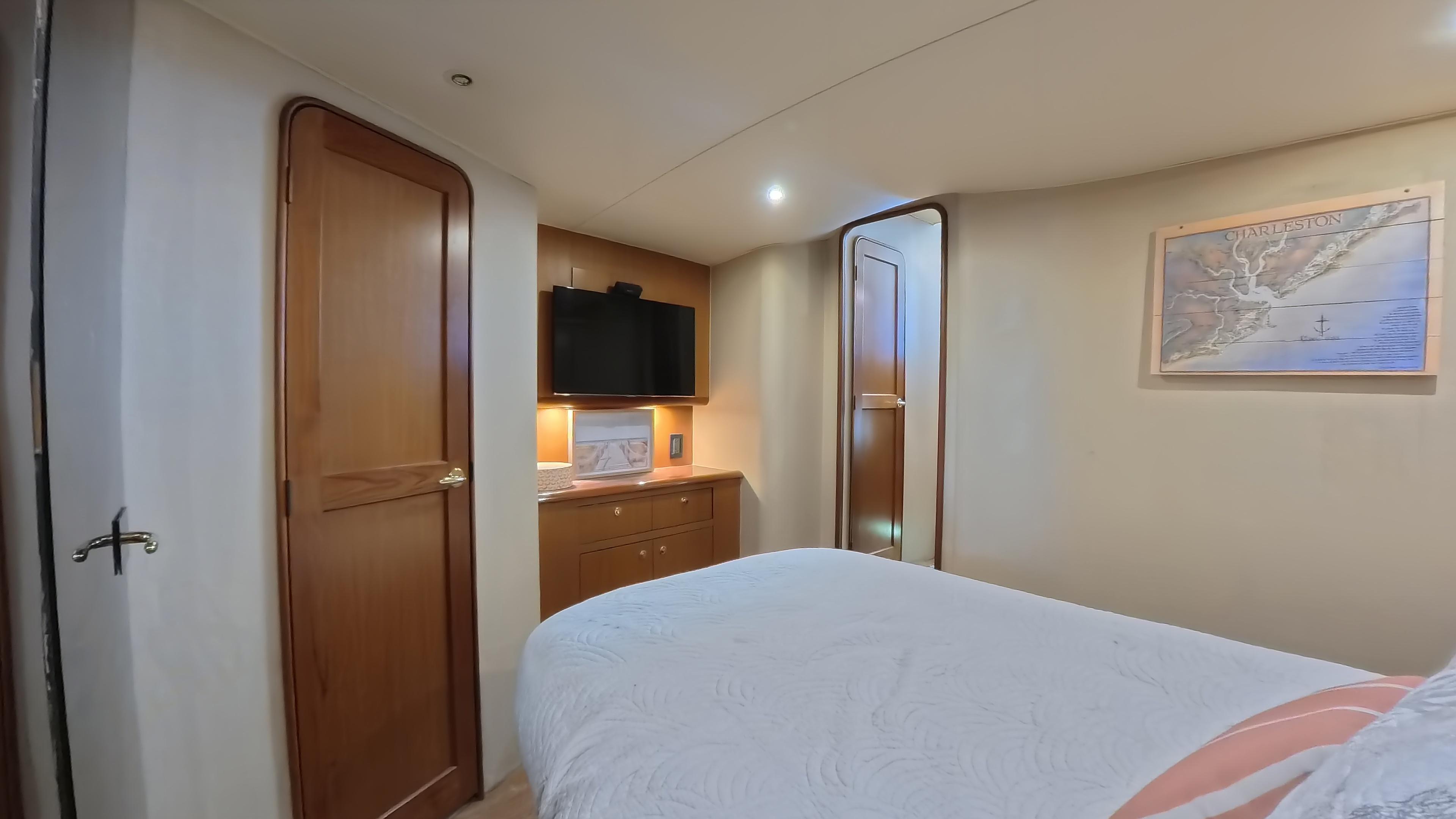 Ocean Yachts-52 SUPER SPORT 2002-No Name SC-US-Luxurious cabin interior of 2002 Ocean Yachts 52 SUPER SPORT with map and TV.-9557435 | Thumbnail