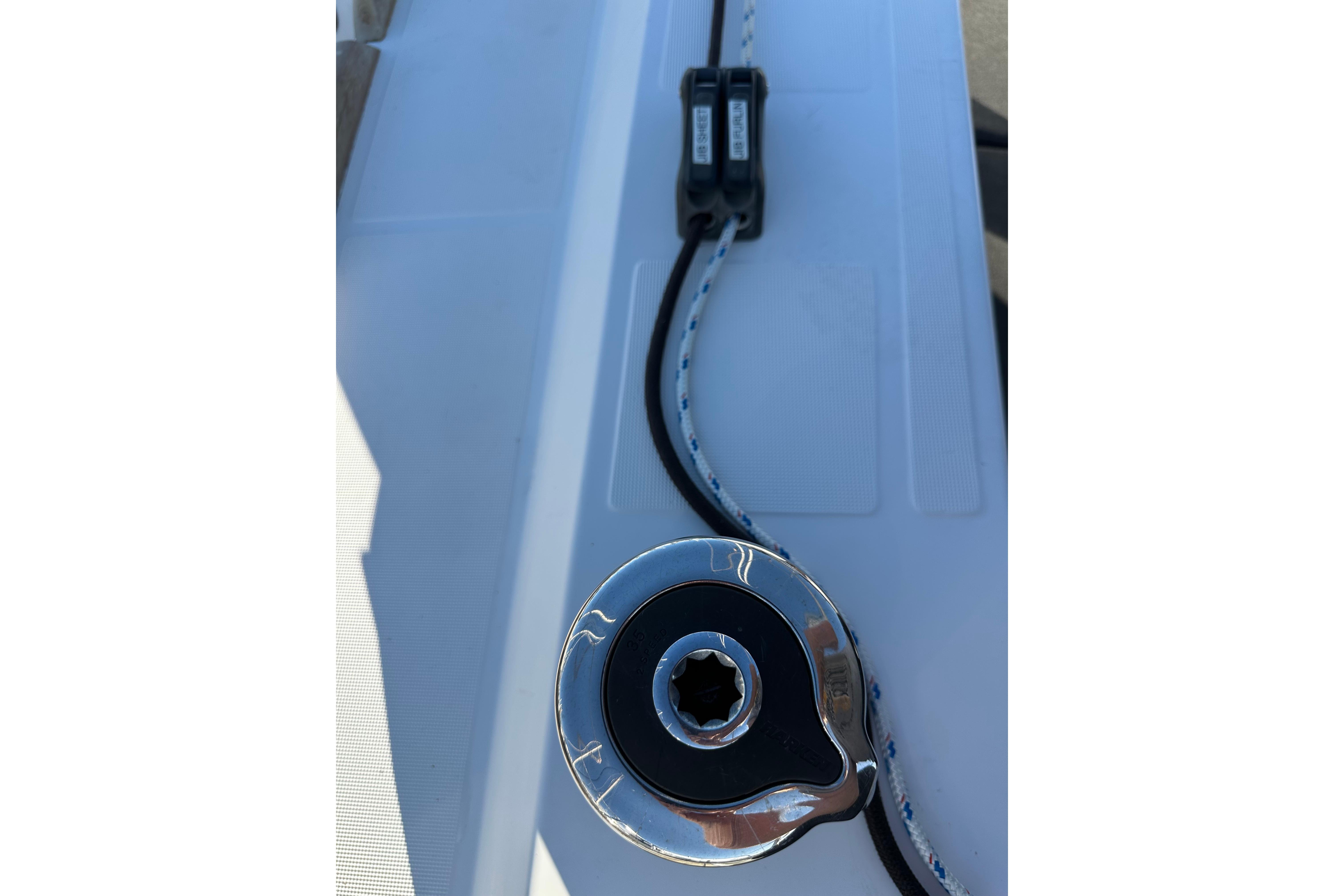 Jeanneau Sun Odyssey 349 deck detail, 2021 model, featuring a winch and rope.