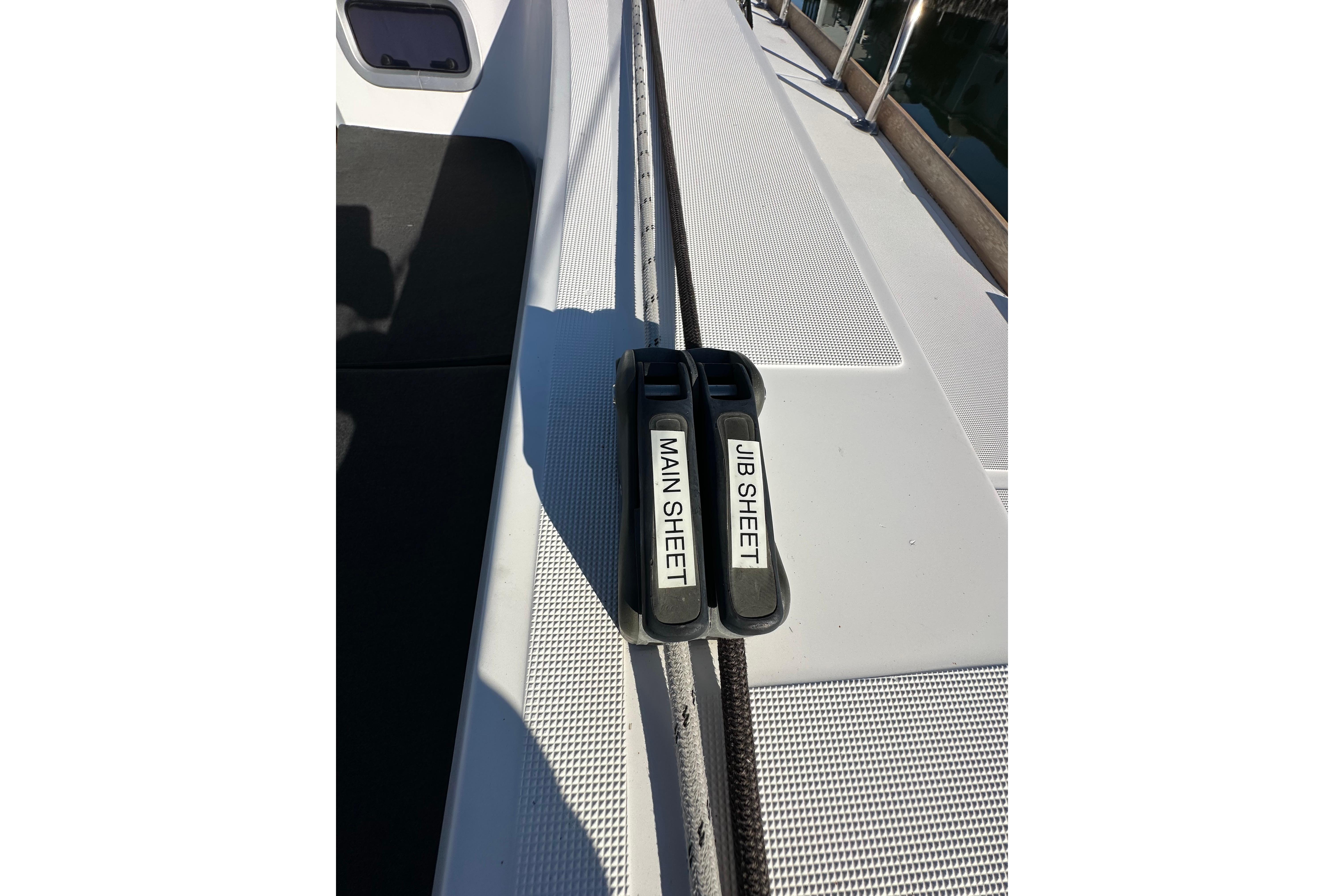 Jeanneau Sun Odyssey 349 sailboat deck with main and jib sheet controls, 2021 model.