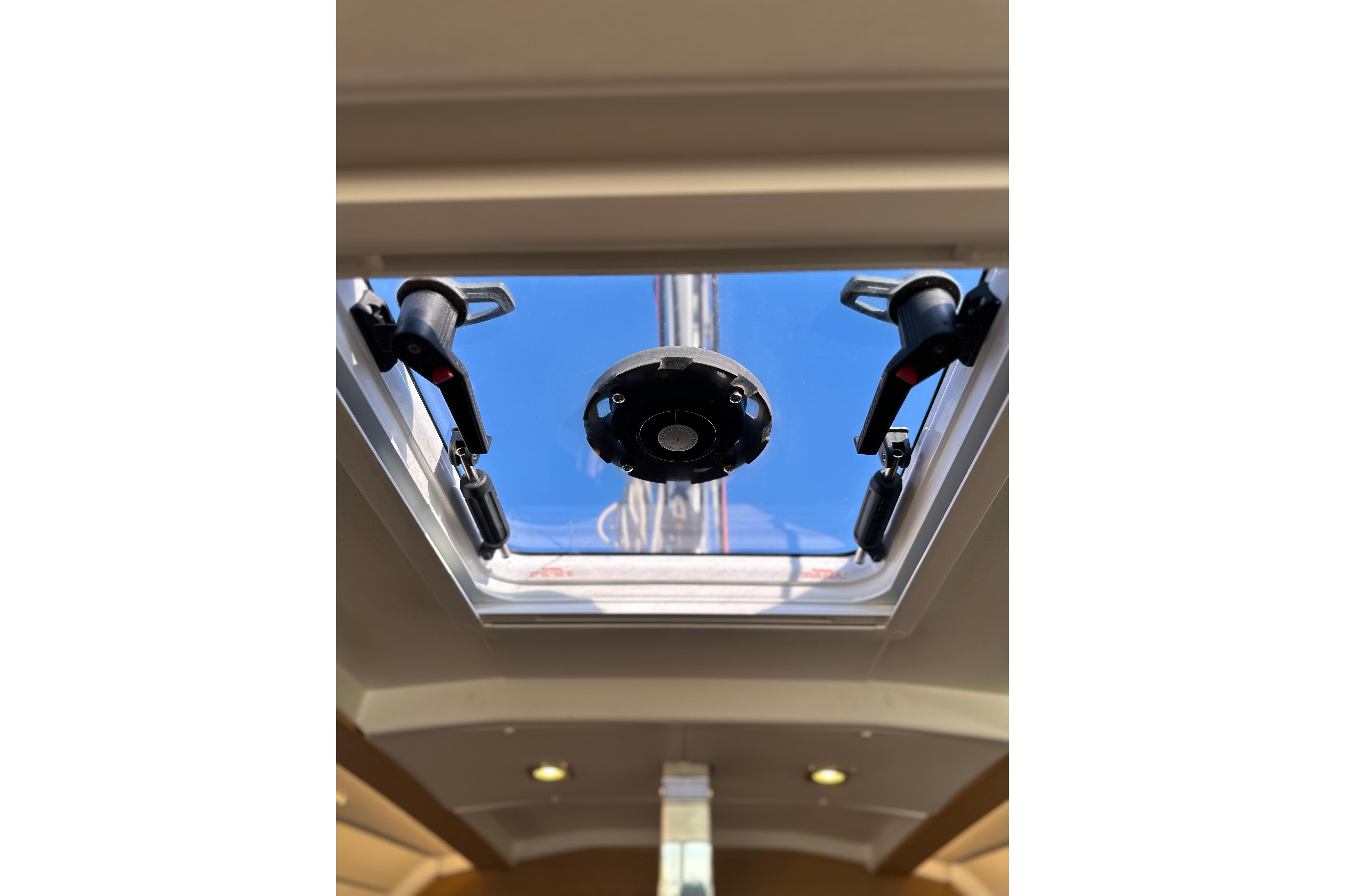 Hatch view from Jeanneau Sun Odyssey 349, 2021 model, showcasing clear blue sky.