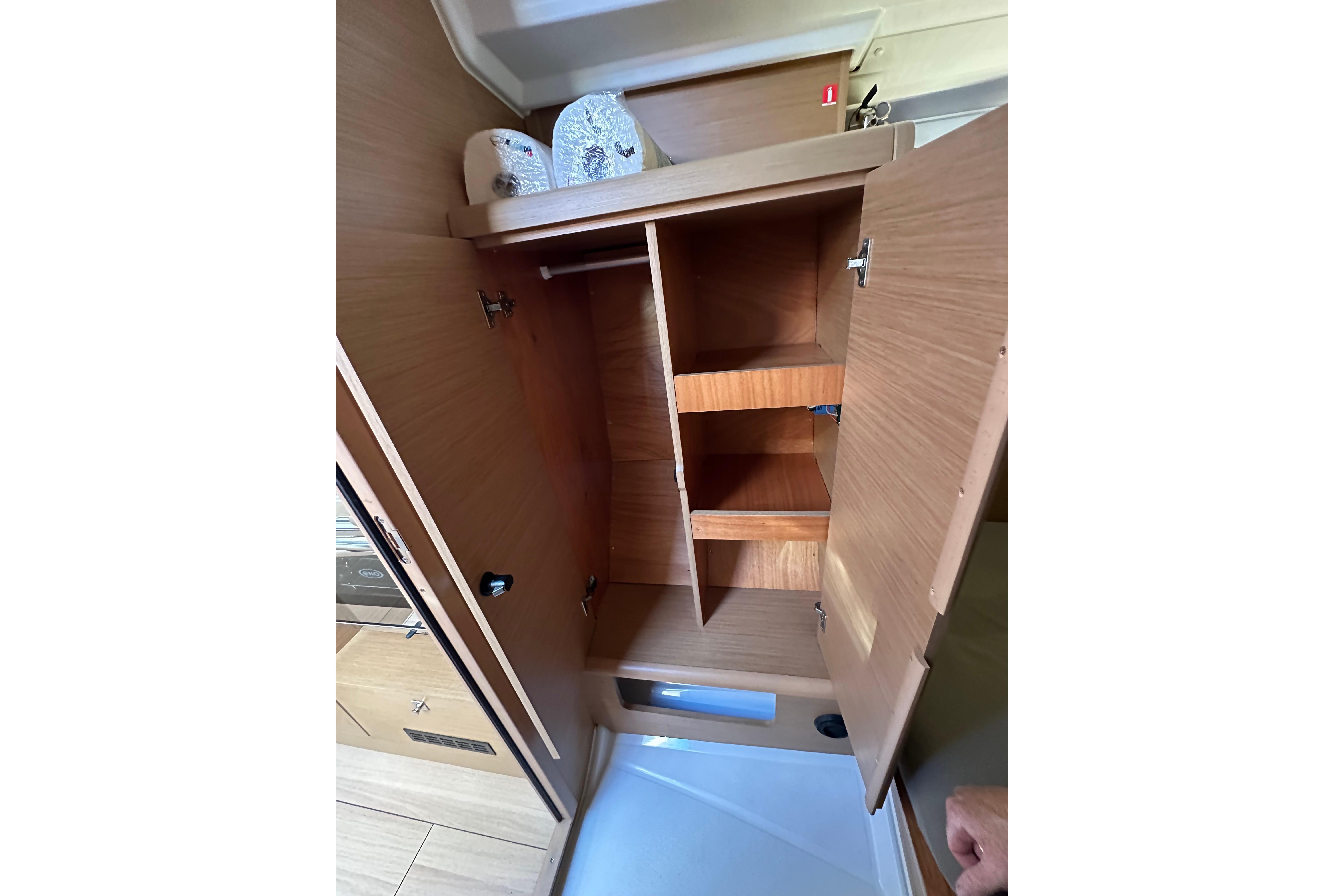 Interior storage cabinet of 2021 Jeanneau Sun Odyssey 349 sailboat.