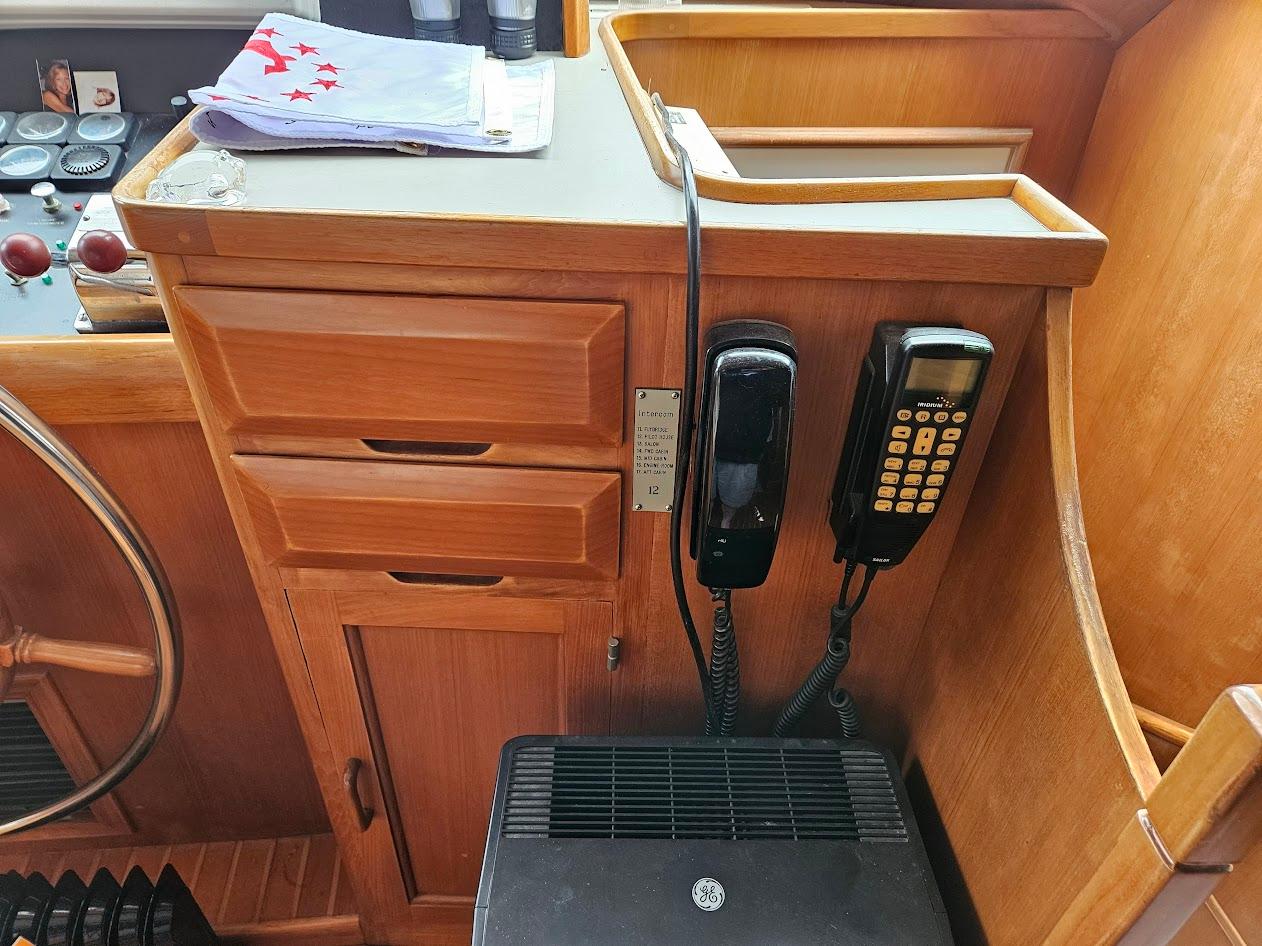 DeFever-53 POC 1987 -WA-US-1987 DeFever 53 POC yacht interior with wooden cabinetry and communication devices.-9787461 | Thumbnail