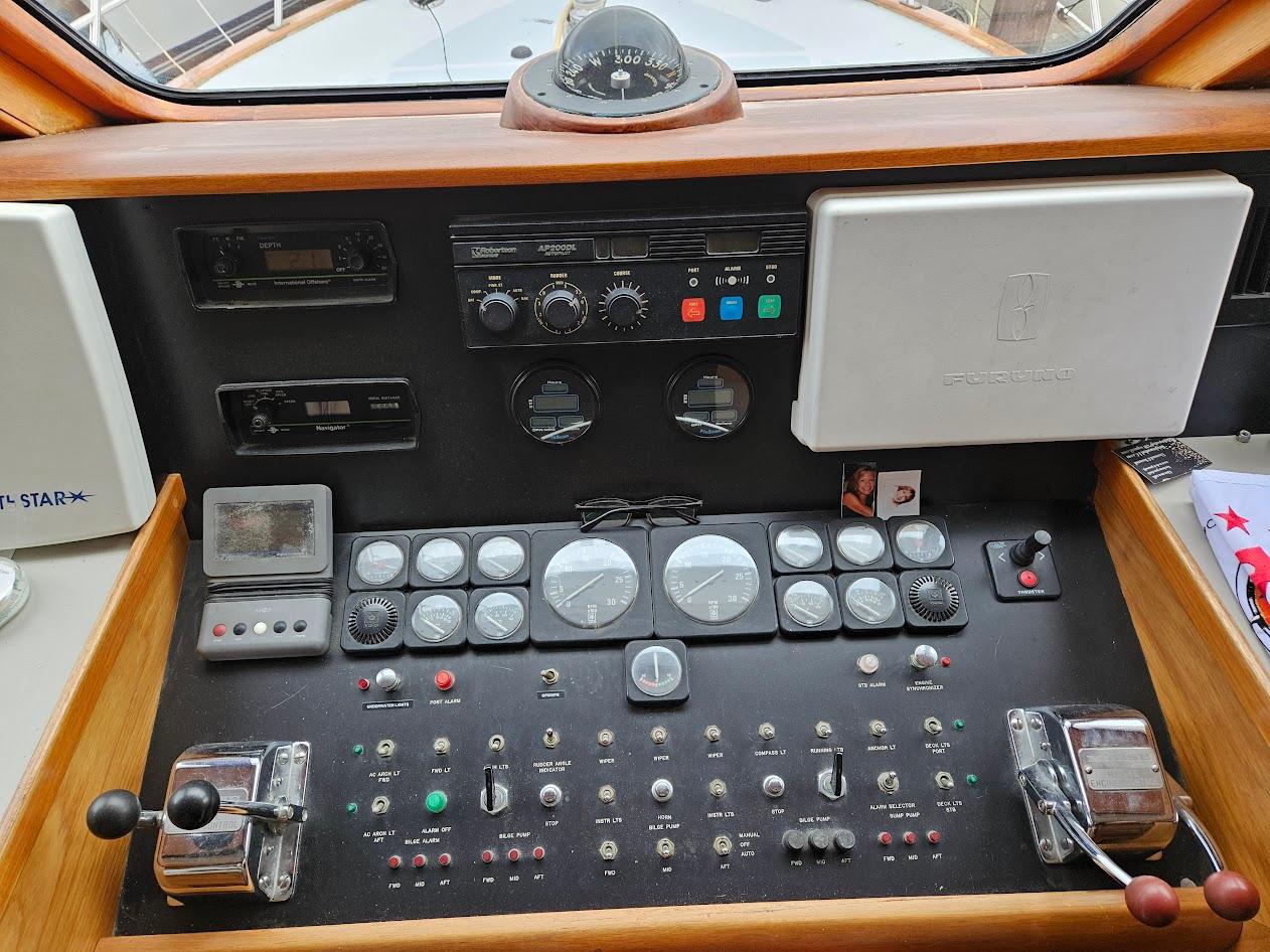 DeFever-53 POC 1987 -WA-US-Control panel of a 1987 DeFever 53 POC yacht with various gauges and controls.-9787461 | Thumbnail