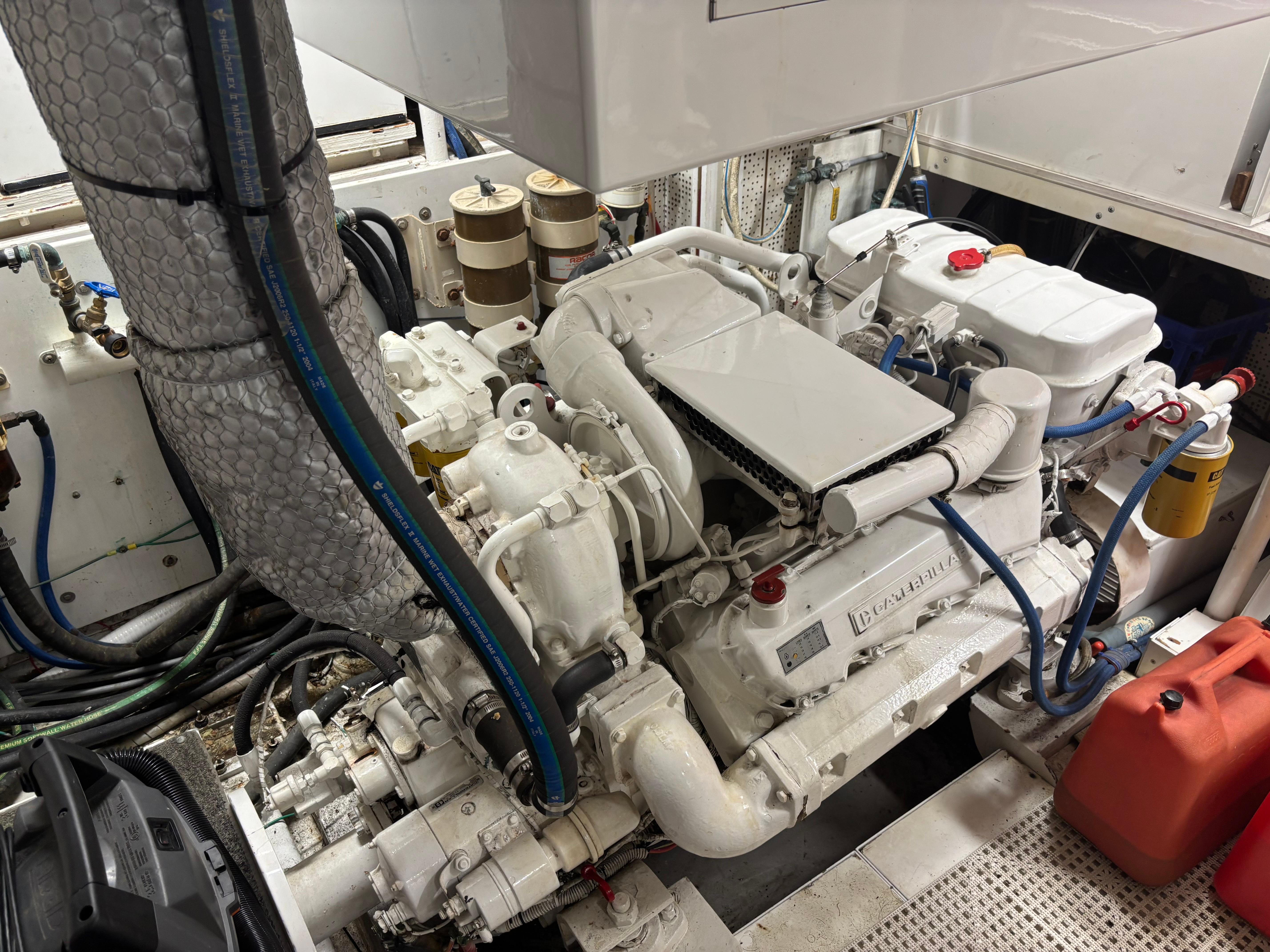 DeFever-53 POC 1987 -WA-US-Engine room of a 1987 DeFever 53 POC yacht, showcasing mechanical components and equipment.-9787461 | Thumbnail