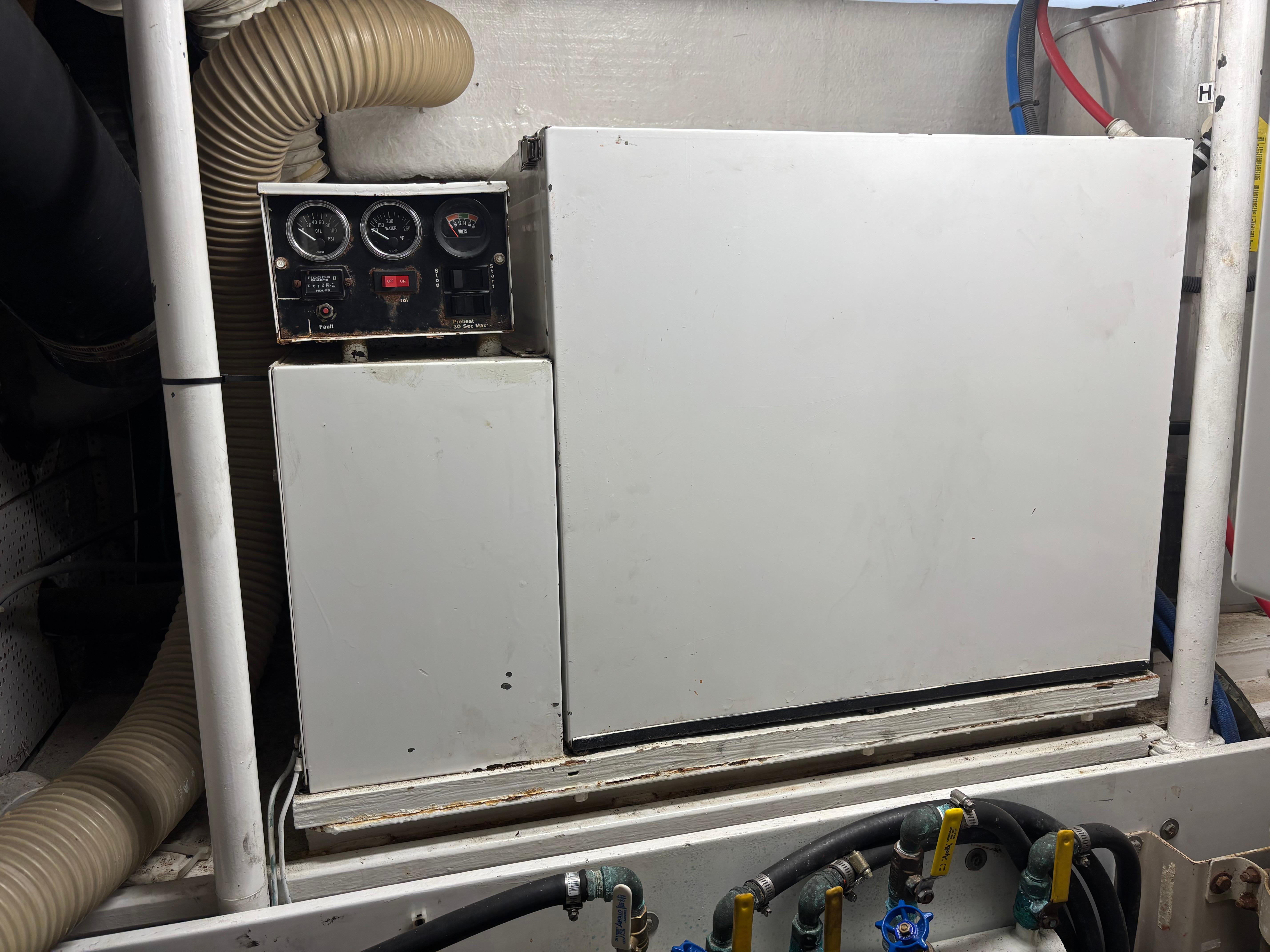 DeFever-53 POC 1987 -WA-US-Engine room of 1987 DeFever 53 POC yacht with control panel and hoses.-9787461 | Thumbnail