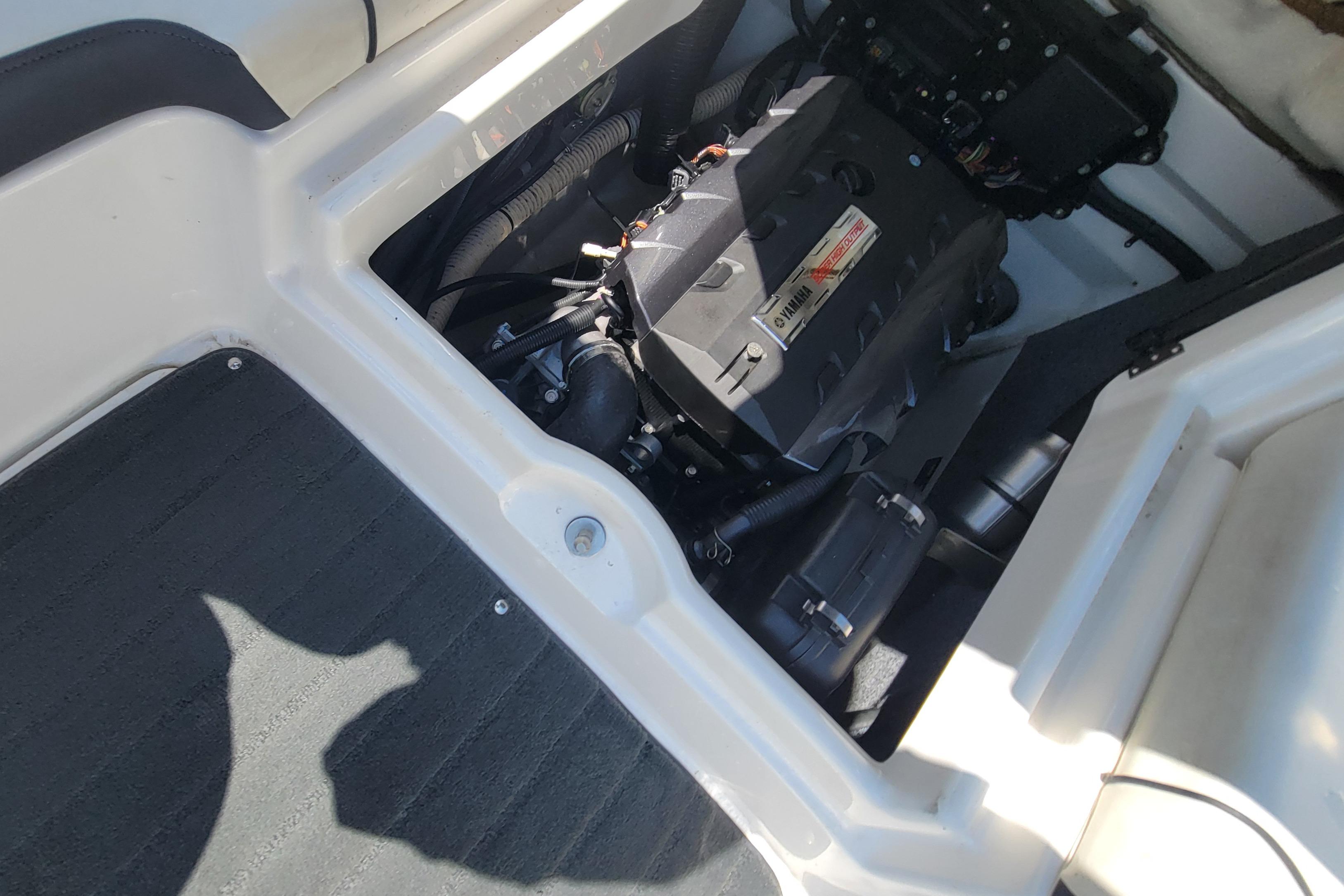 Engine compartment of a 2016 Yamaha Boats SX192, showcasing internal components and layout.