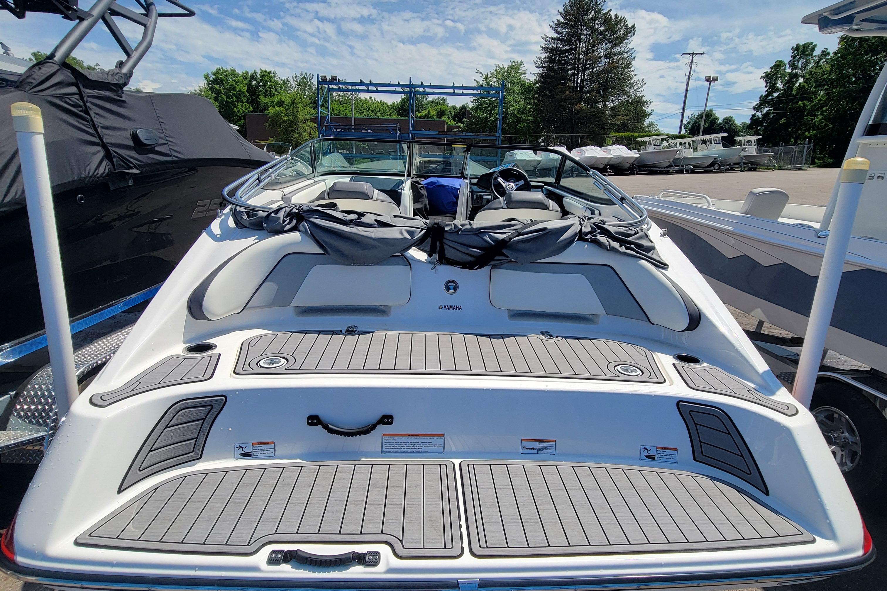 2016 Yamaha Boats SX192, rear view, parked outdoors on a sunny day.