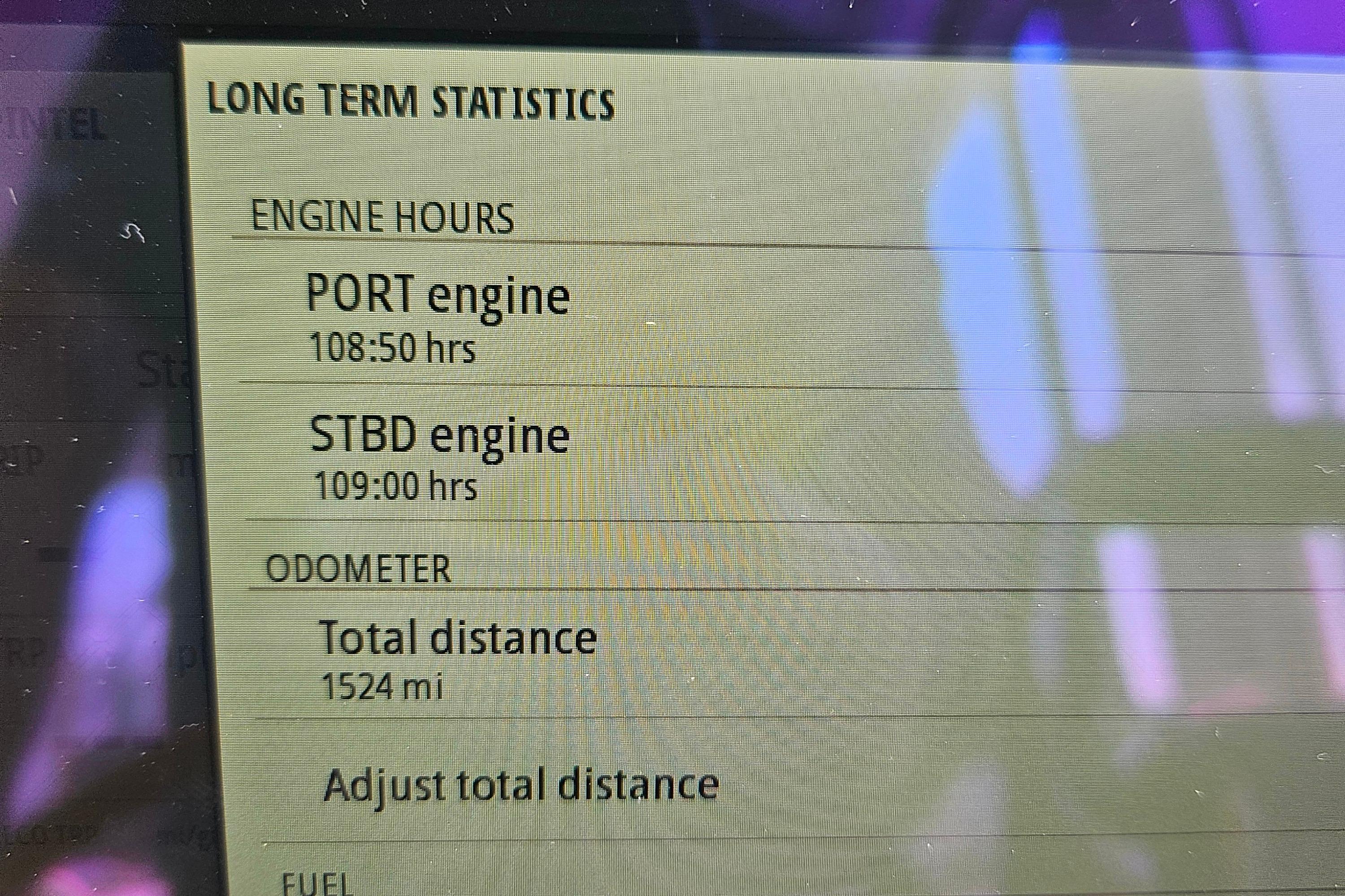 Display showing MJM 35 engine hours and odometer reading, 2023 model.