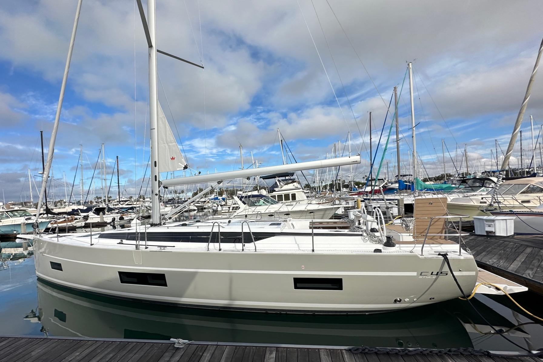 Bavaria-C45 2024-In stock and availabe now CA-US-2024 Bavaria C45 sailboat docked in a marina under a cloudy sky.-9712200