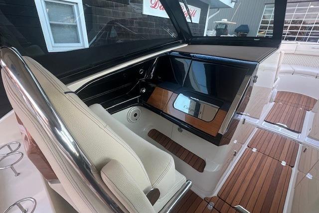2024 Chris-Craft Calypso 35 interior with elegant seating and sleek dashboard design.