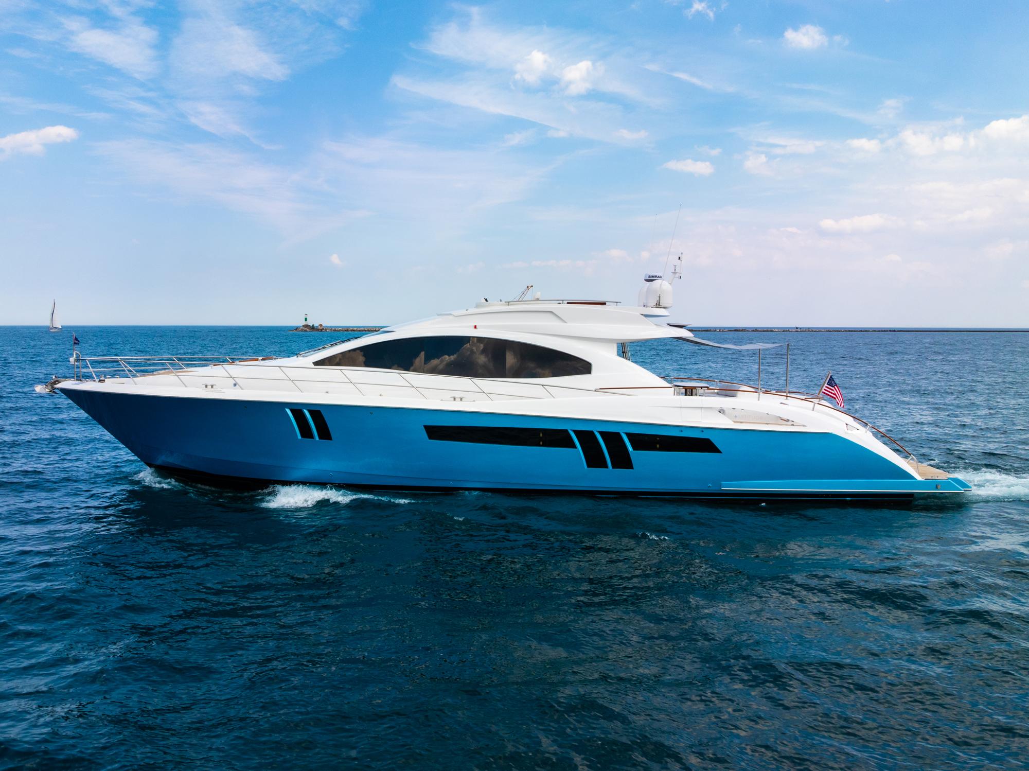 Lazzara-78 LSX TWIN ENGINES 2010-LATITUDE IL-US-2010 Lazzara 78 LSX yacht cruising on open sea under clear skies.-9307533 | Thumbnail