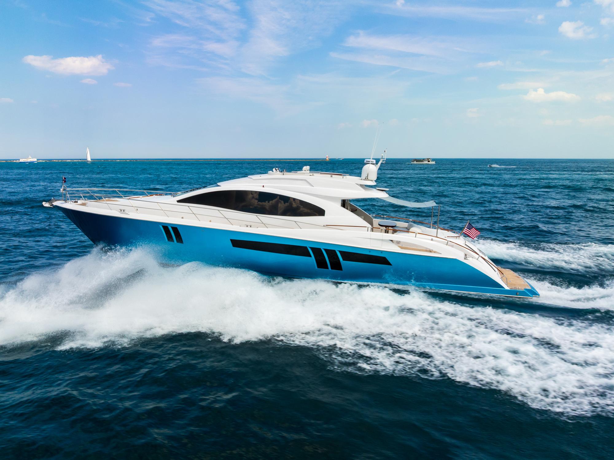 Picture of LATITUDE Lazzara 78 ft' 78 LSX TWIN ENGINES Luxury 2010 Lazzara 78 LSX yacht cruising on open sea with twin engines. 
