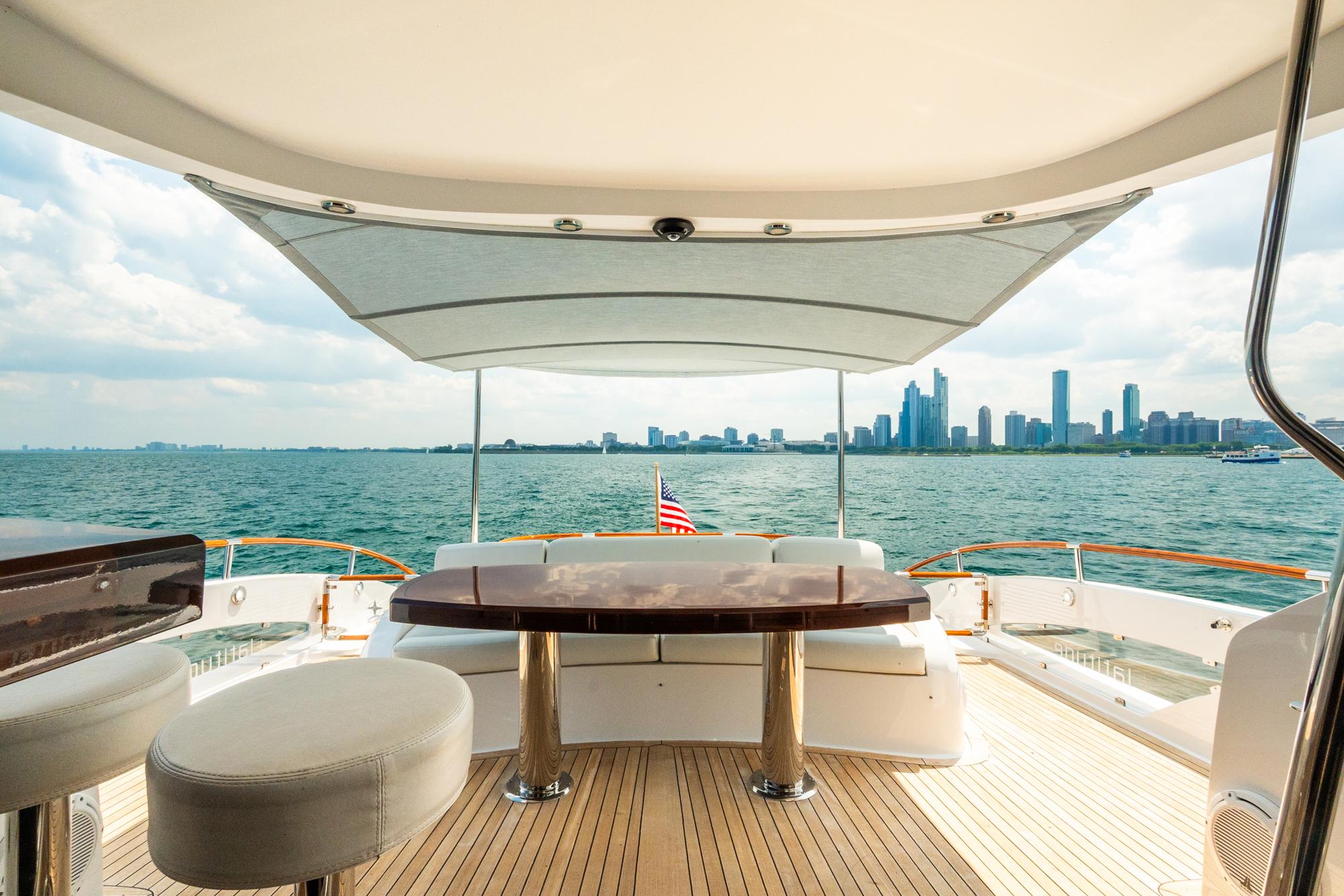 Lazzara-78 LSX TWIN ENGINES 2010-LATITUDE IL-US-Luxurious 2010 Lazzara 78 LSX yacht with city skyline view, elegant deck seating.-9307533 | Thumbnail