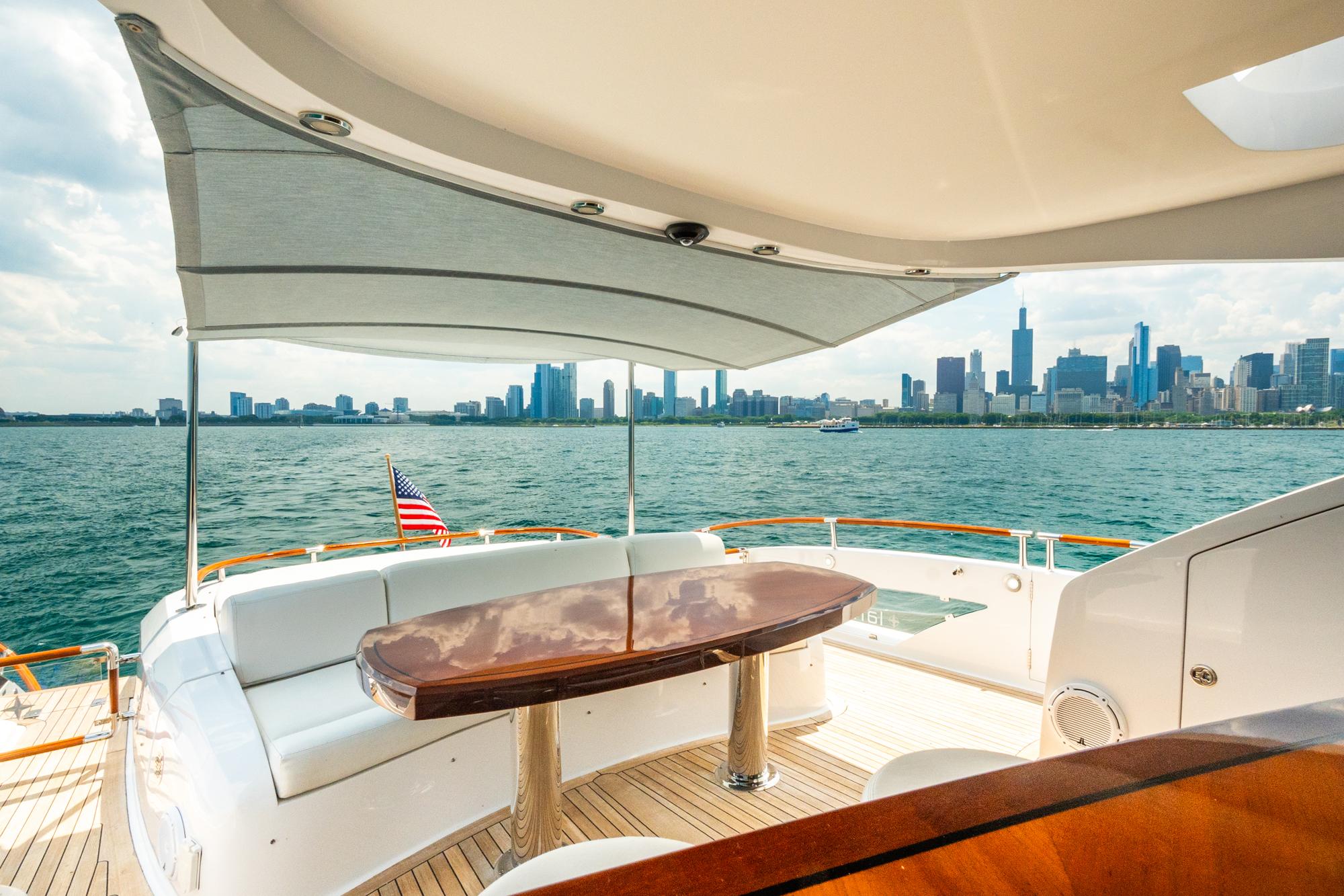 Lazzara-78 LSX TWIN ENGINES 2010-LATITUDE IL-US-Luxurious 2010 Lazzara 78 LSX yacht with city skyline view and elegant deck seating.-9307533 | Thumbnail