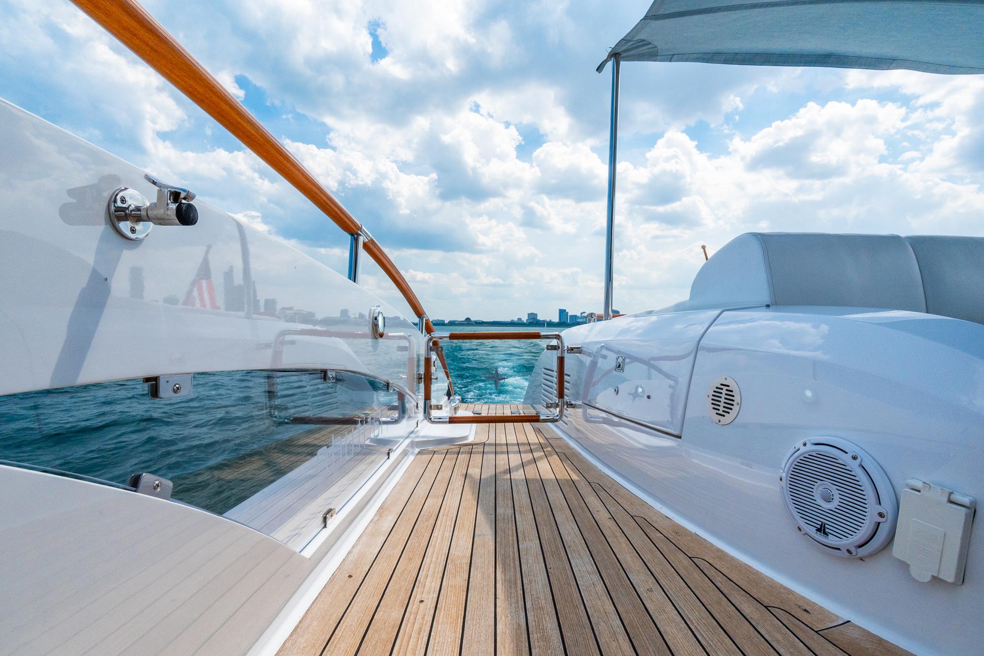 Lazzara-78 LSX TWIN ENGINES 2010-LATITUDE IL-US-Luxurious 2010 Lazzara 78 LSX yacht deck with wooden flooring and ocean view.-9307533 | Thumbnail