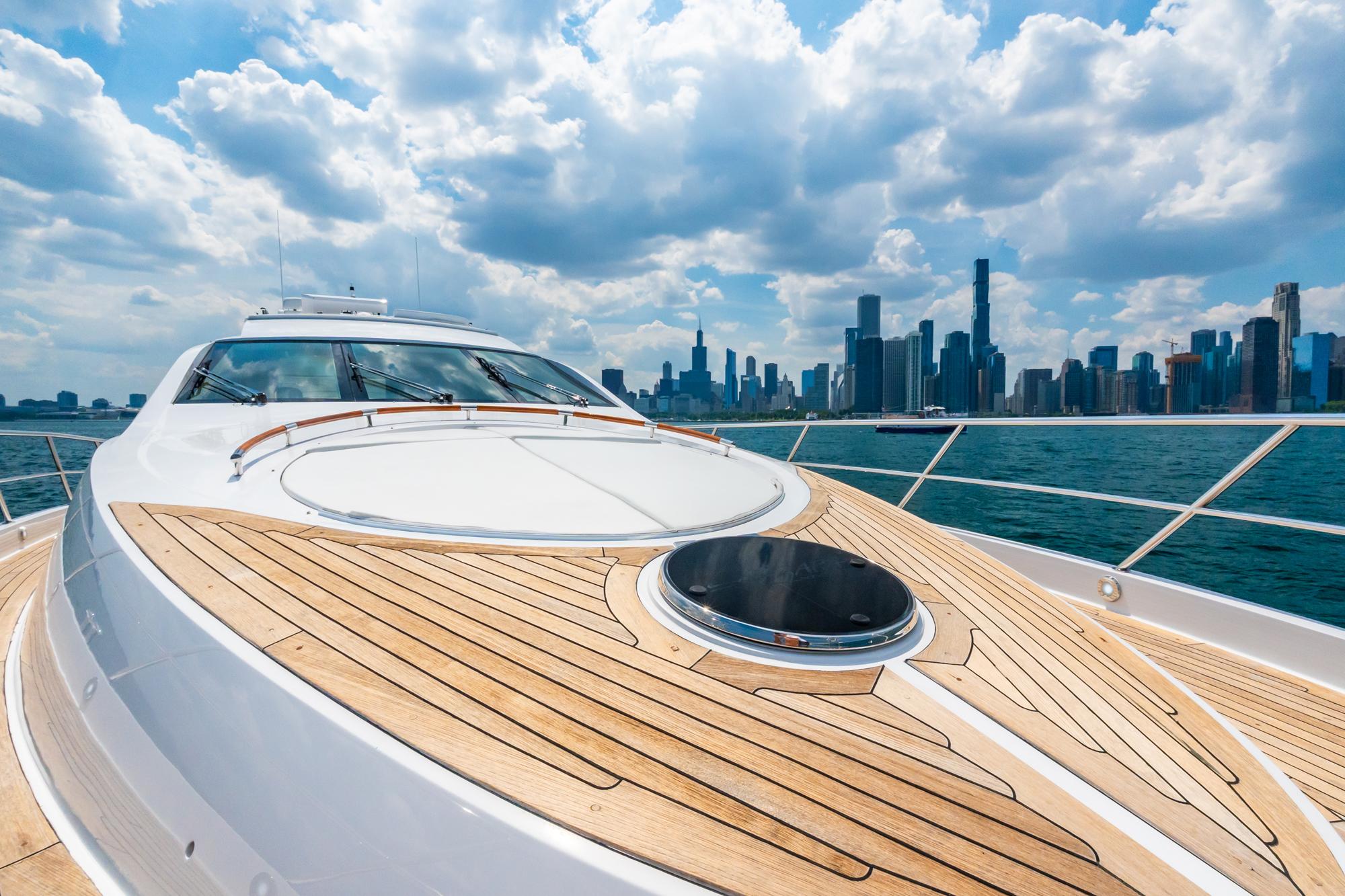 Lazzara-78 LSX TWIN ENGINES 2010-LATITUDE IL-US-Luxurious 2010 Lazzara 78 LSX yacht cruising with city skyline backdrop under cloudy sky.-9307533 | Thumbnail