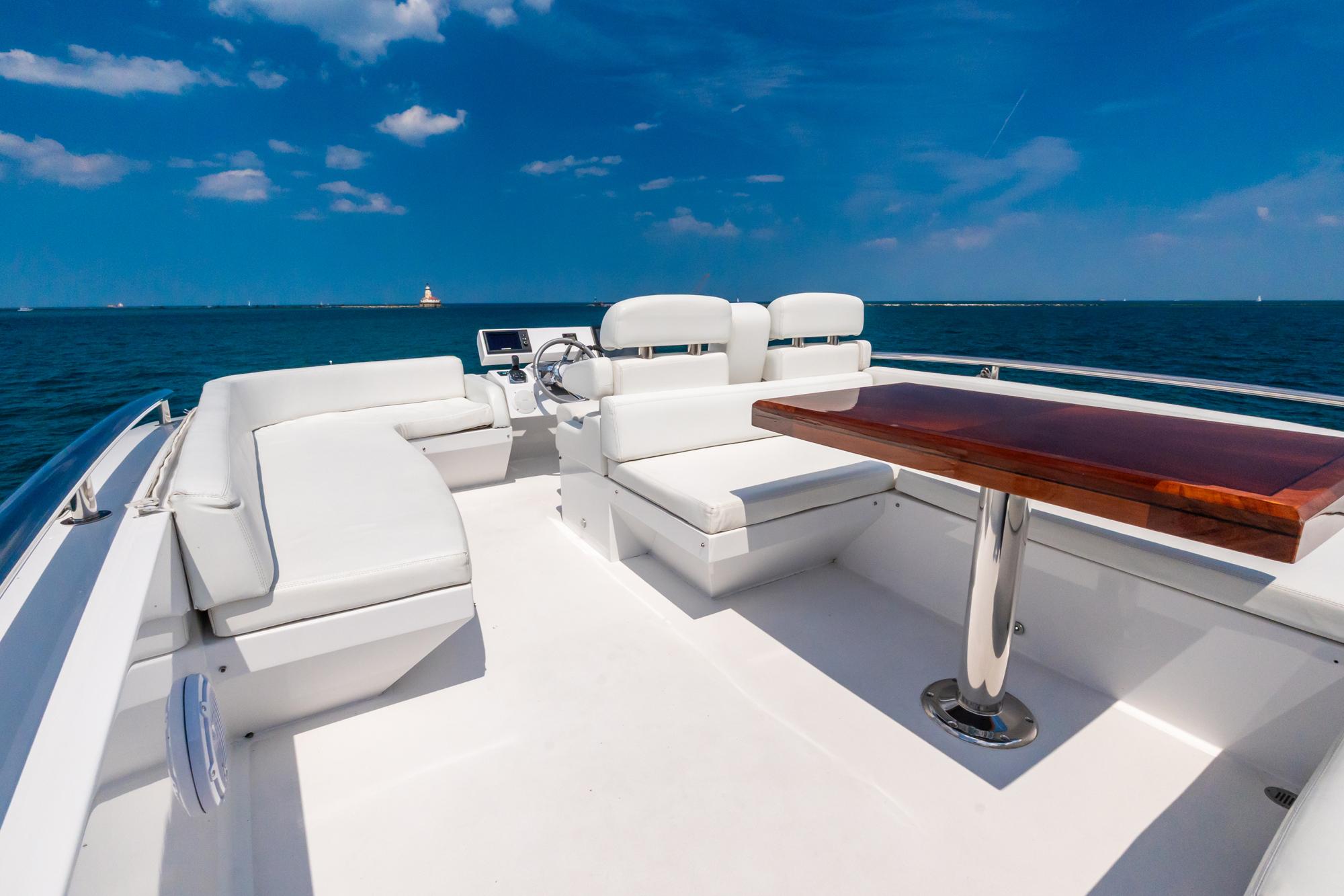Lazzara-78 LSX TWIN ENGINES 2010-LATITUDE IL-US-Luxurious 2010 Lazzara 78 LSX yacht deck with seating and table, ocean view.-9307533 | Thumbnail