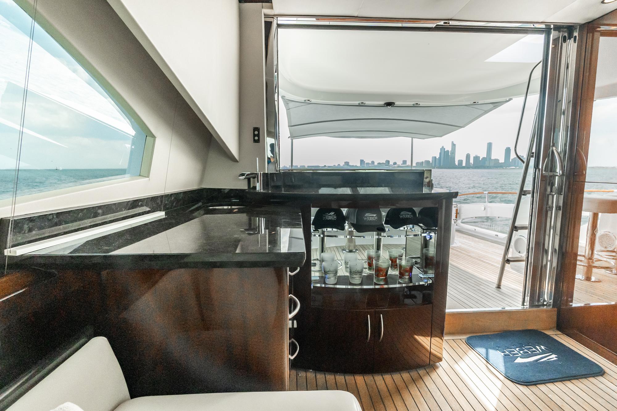 Lazzara-78 LSX TWIN ENGINES 2010-LATITUDE IL-US-Luxurious interior of 2010 Lazzara 78 LSX yacht with bar and ocean view.-9307533 | Thumbnail