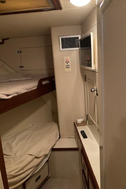 Bertram-58 Motor Yacht 1977-K Bear FL-US-1977 Bertram 58 Motor Yacht cabin with bunk beds and storage.-9617651 | Thumbnail