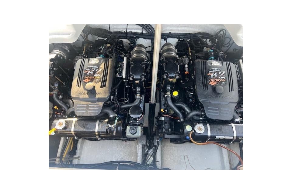 Twin engines of a 2007 Crownline 320 LS boat, showcasing MerCruiser MPI Horizon.