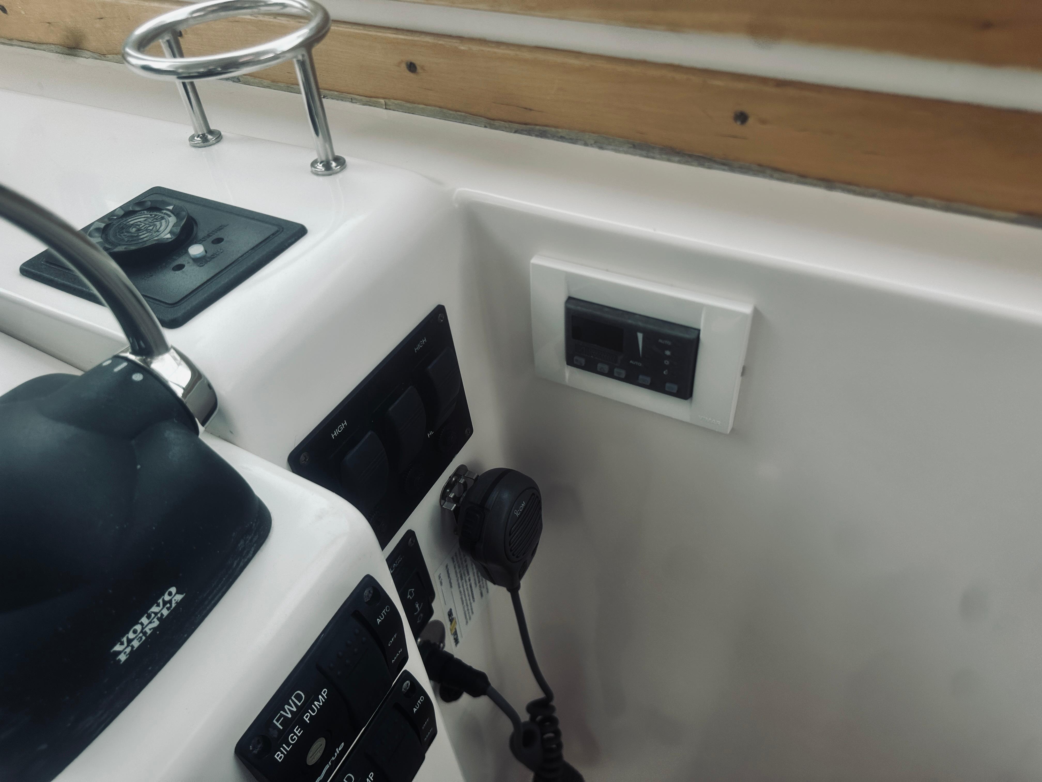 Control panel of a 2007 Sabreline 34 Express boat with Volvo Penta throttle.