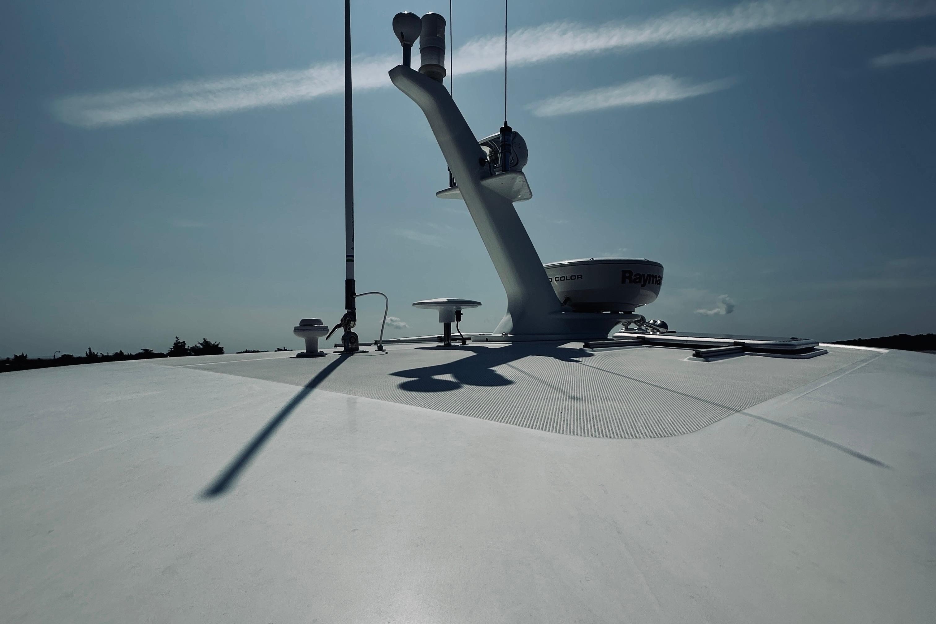 Rooftop view of 2007 Sabreline 34 Express boat with radar and antennas.