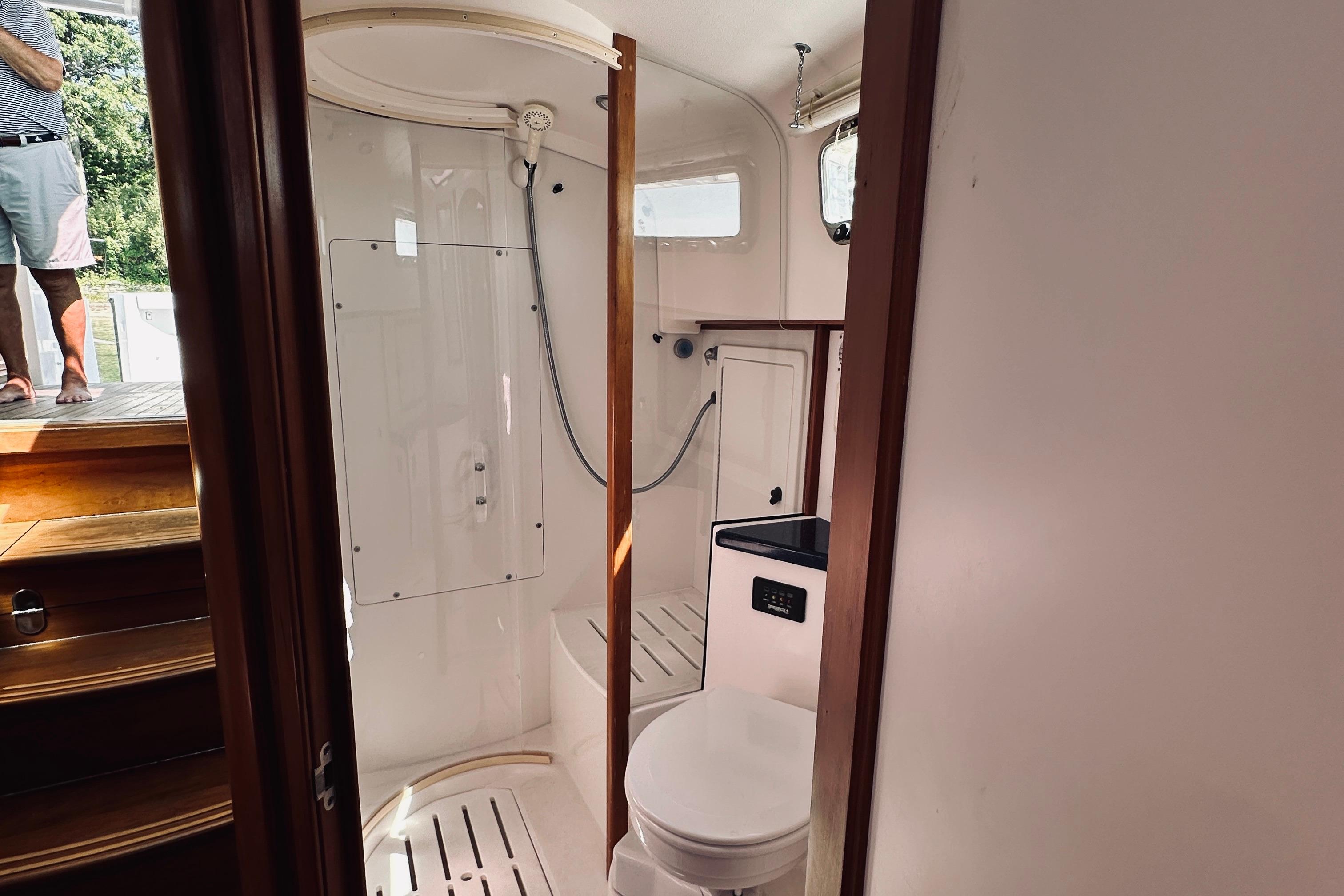 2007 Sabreline 34 Express boat interior with bathroom and shower area.