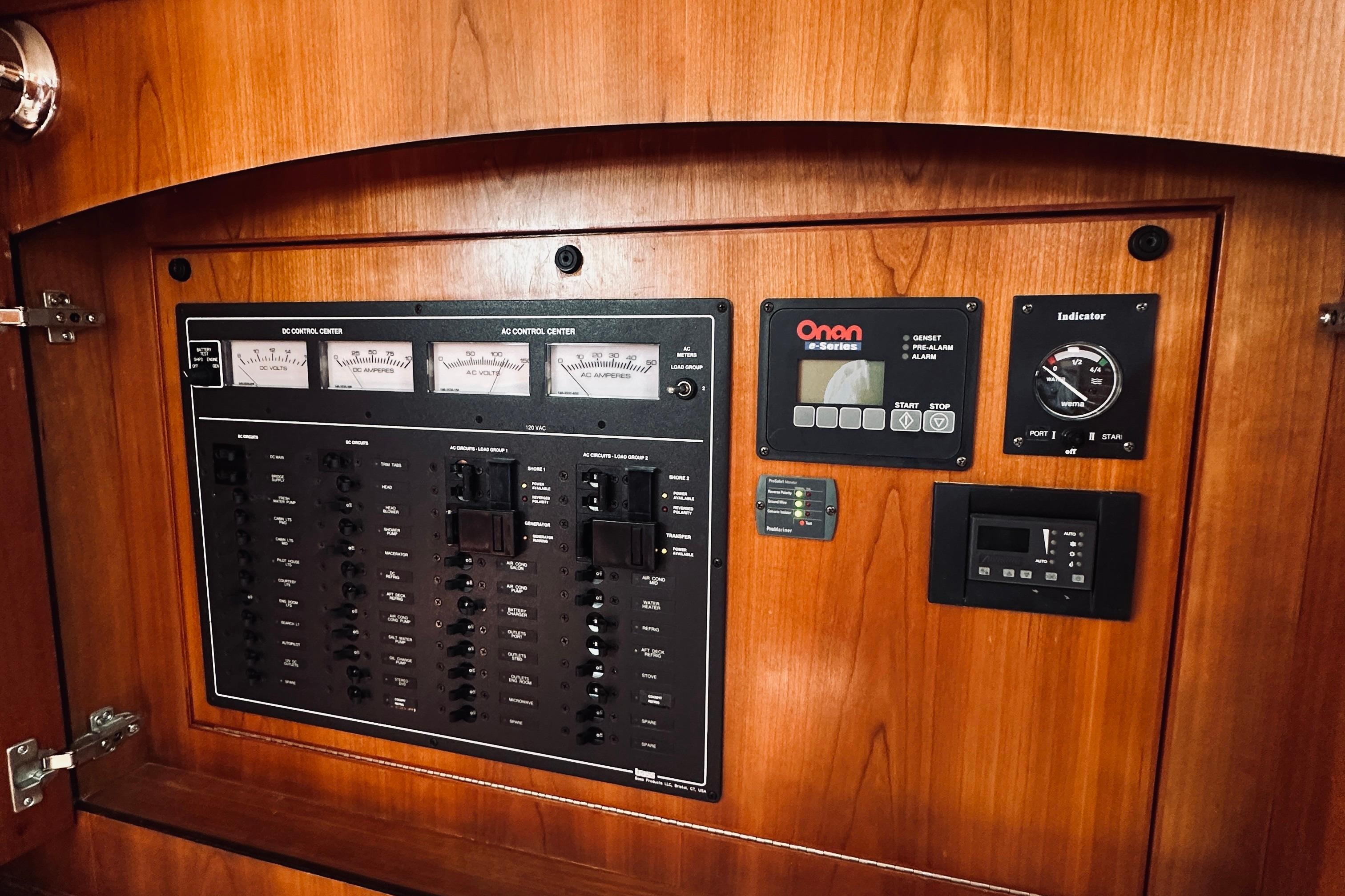 Electrical control panel on a 2007 Sabreline 34 Express boat, featuring gauges and switches.
