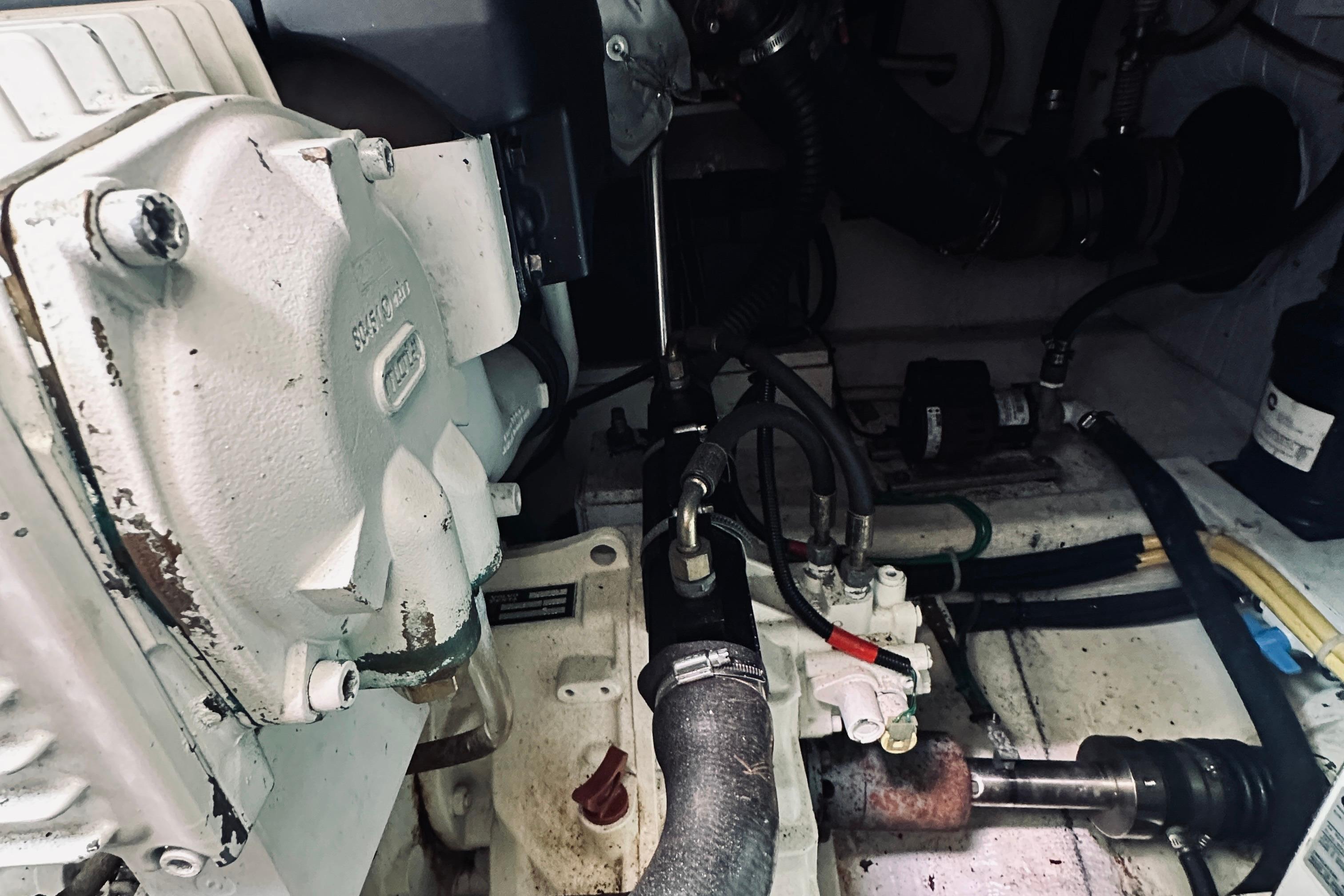 Engine compartment of a 2007 Sabreline 34 Express boat, showcasing mechanical components.