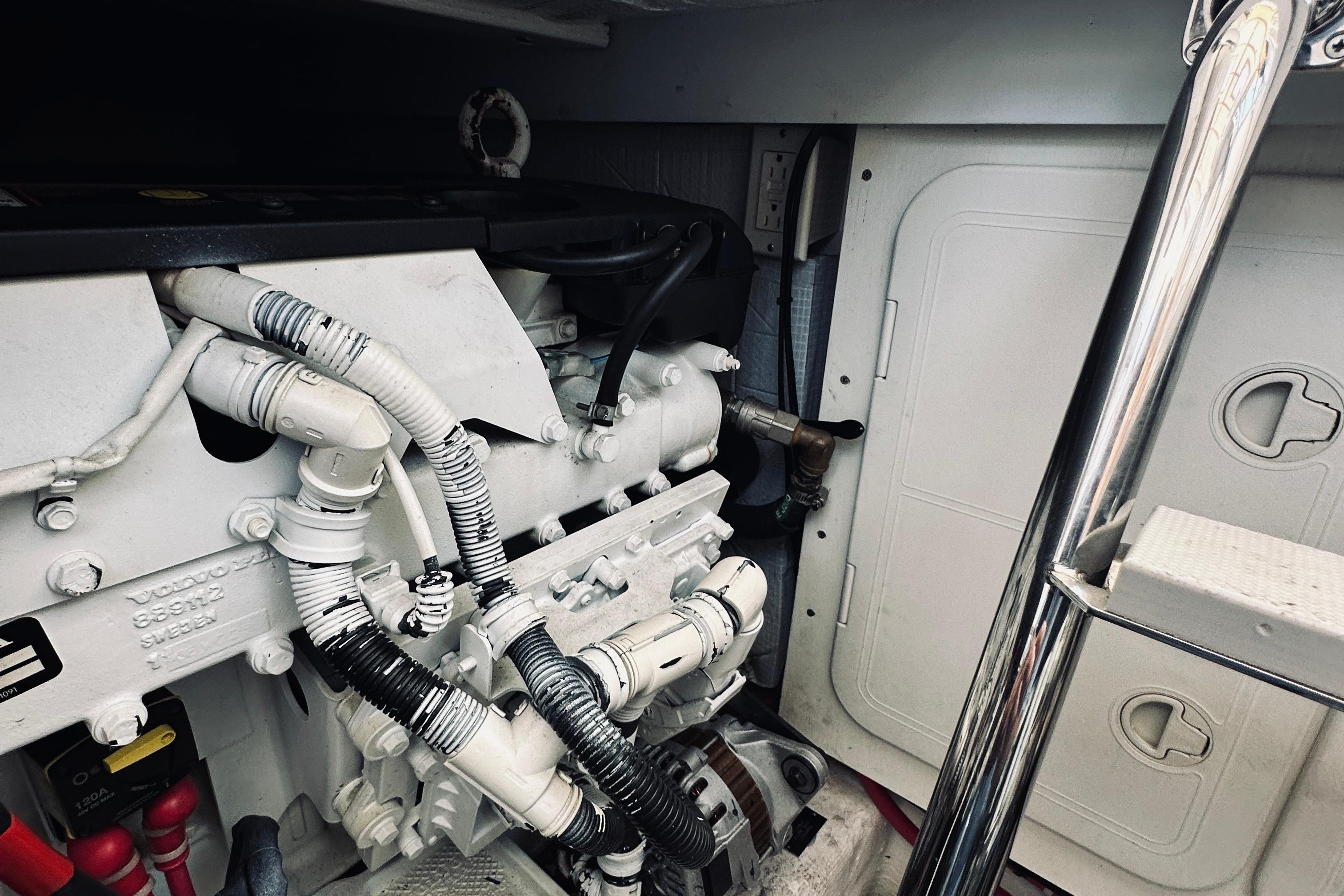 Engine compartment of 2007 Sabreline 34 Express boat, featuring detailed mechanical components.