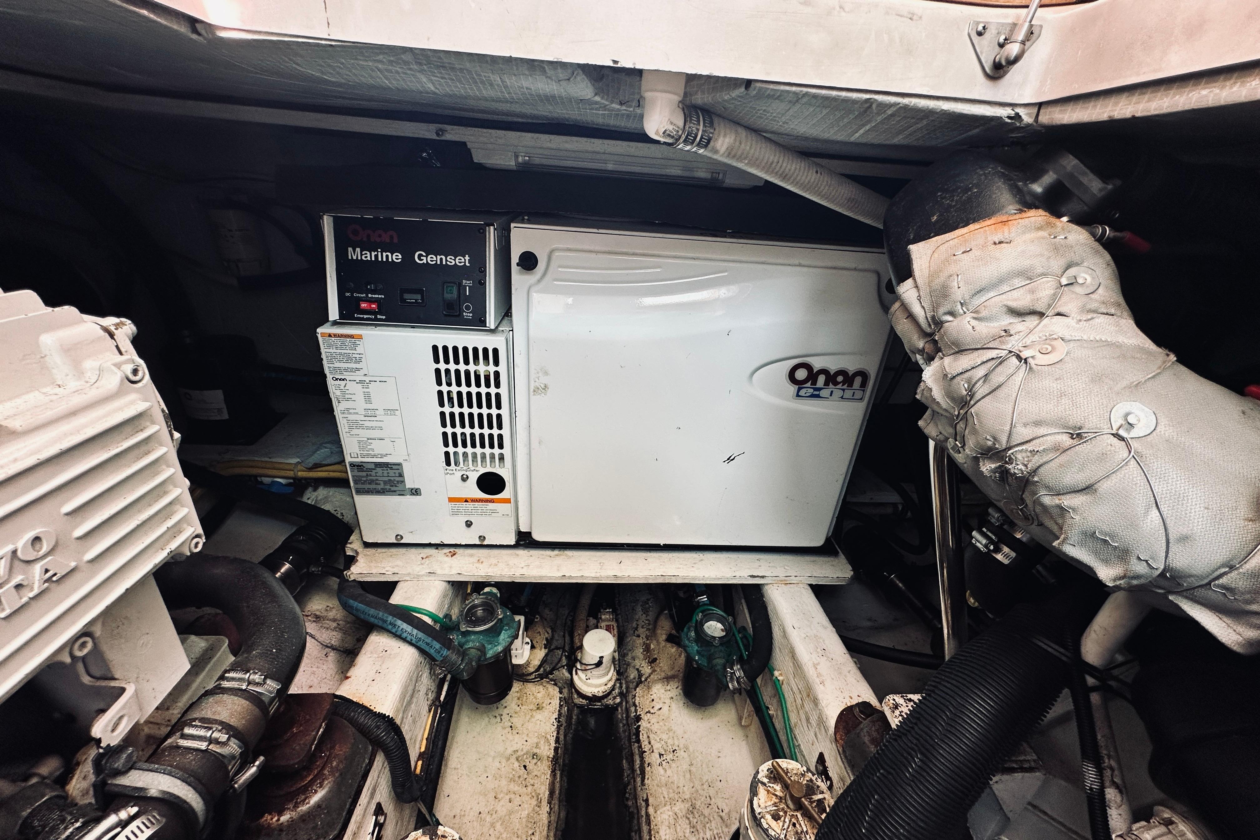 Engine room of 2007 Sabreline 34 Express with Onan marine generator.
