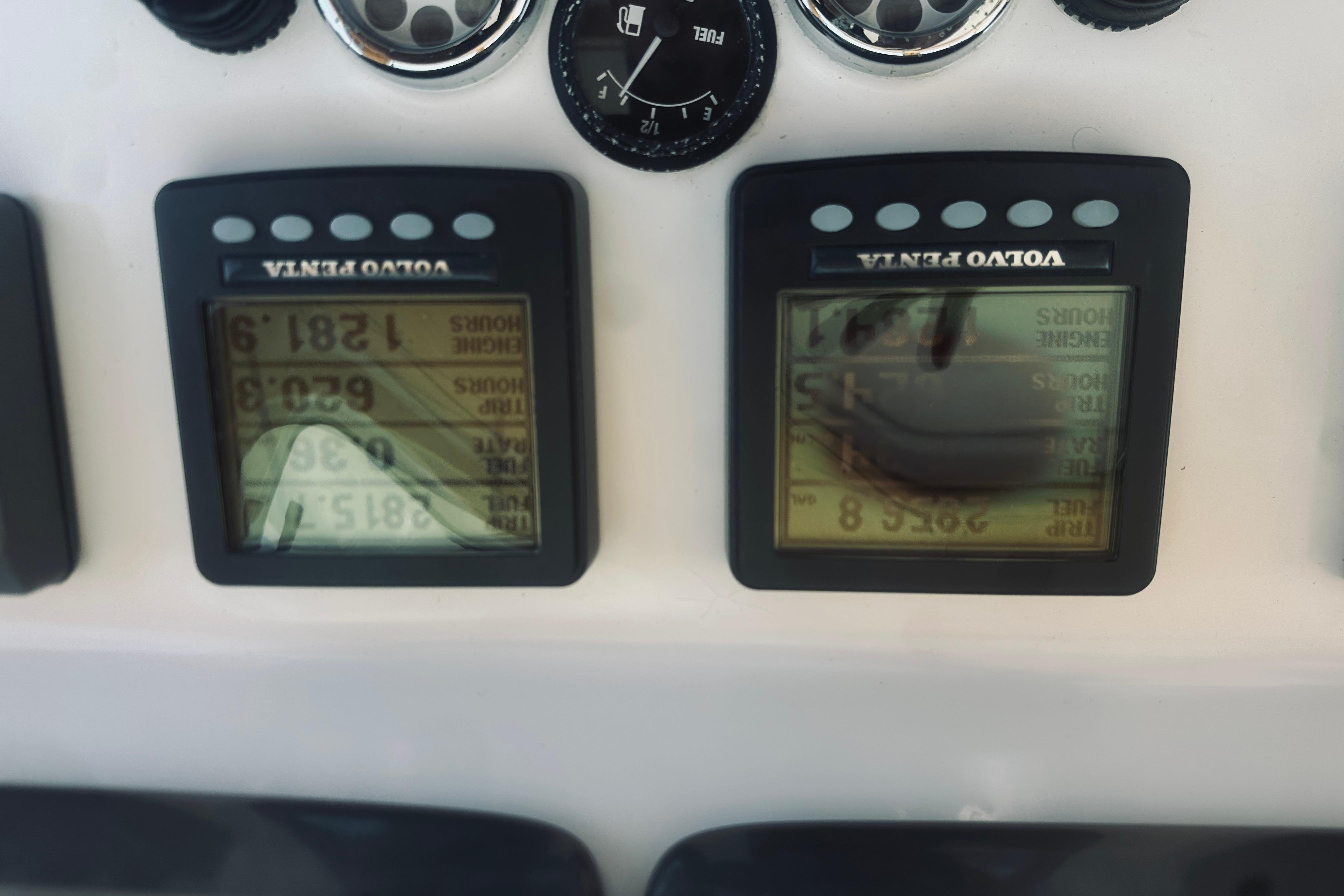 Volvo Penta engine displays on 2007 Sabreline 34 Express boat dashboard.
