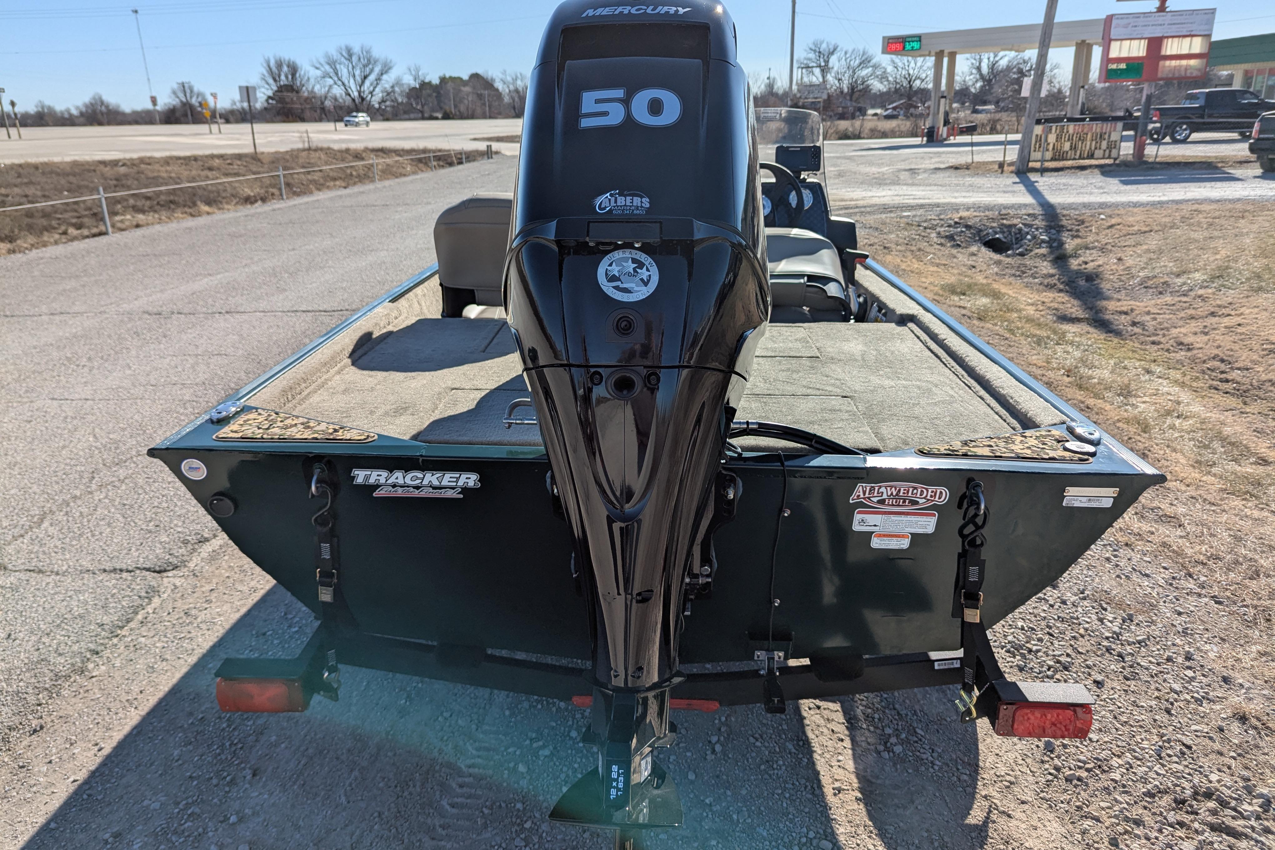 2025 Tracker Bass Tracker Classic Limited boat with Mercury 50 engine on a trailer.