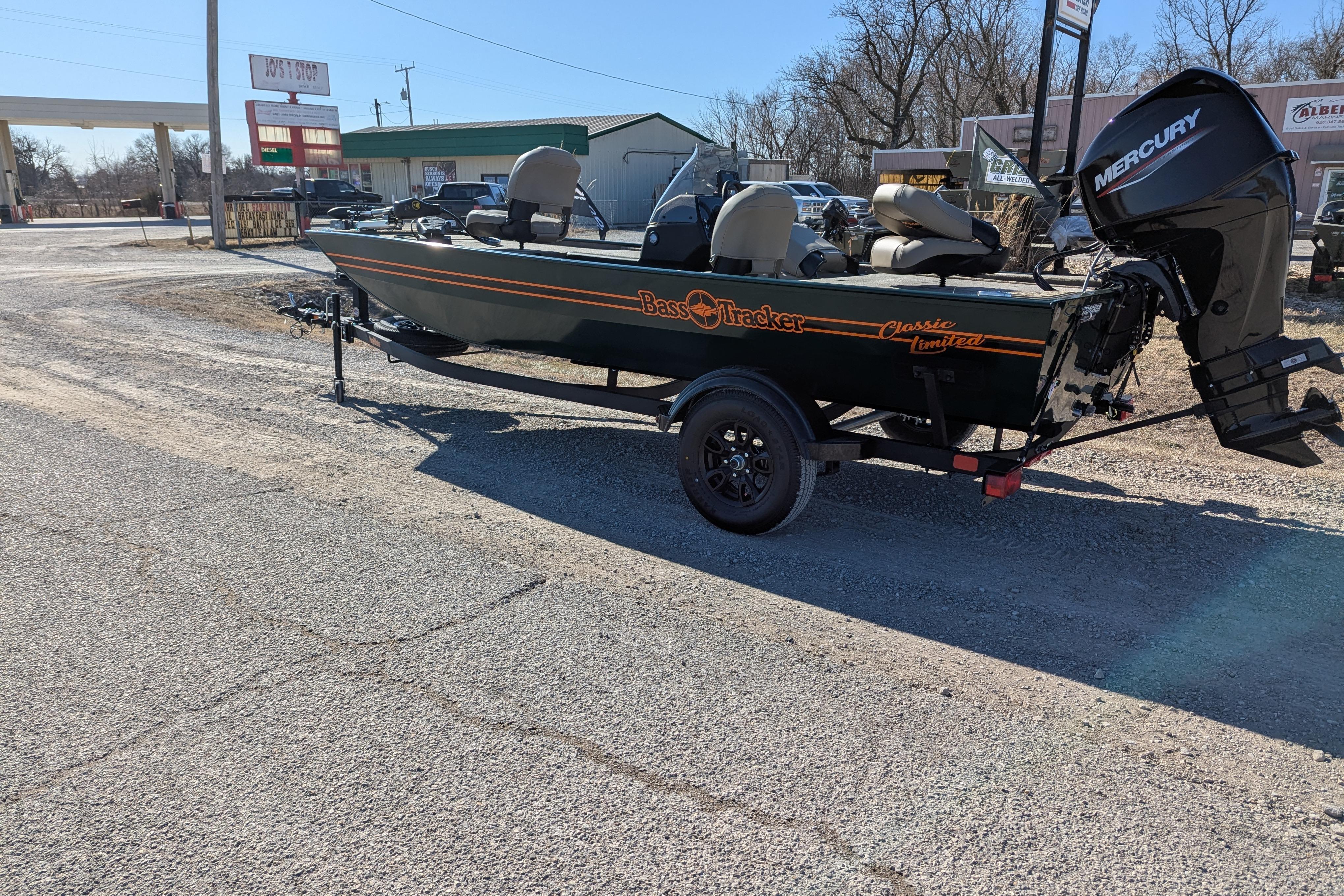 2025 Tracker Bass Tracker Classic Limited boat with Mercury engine on a trailer.