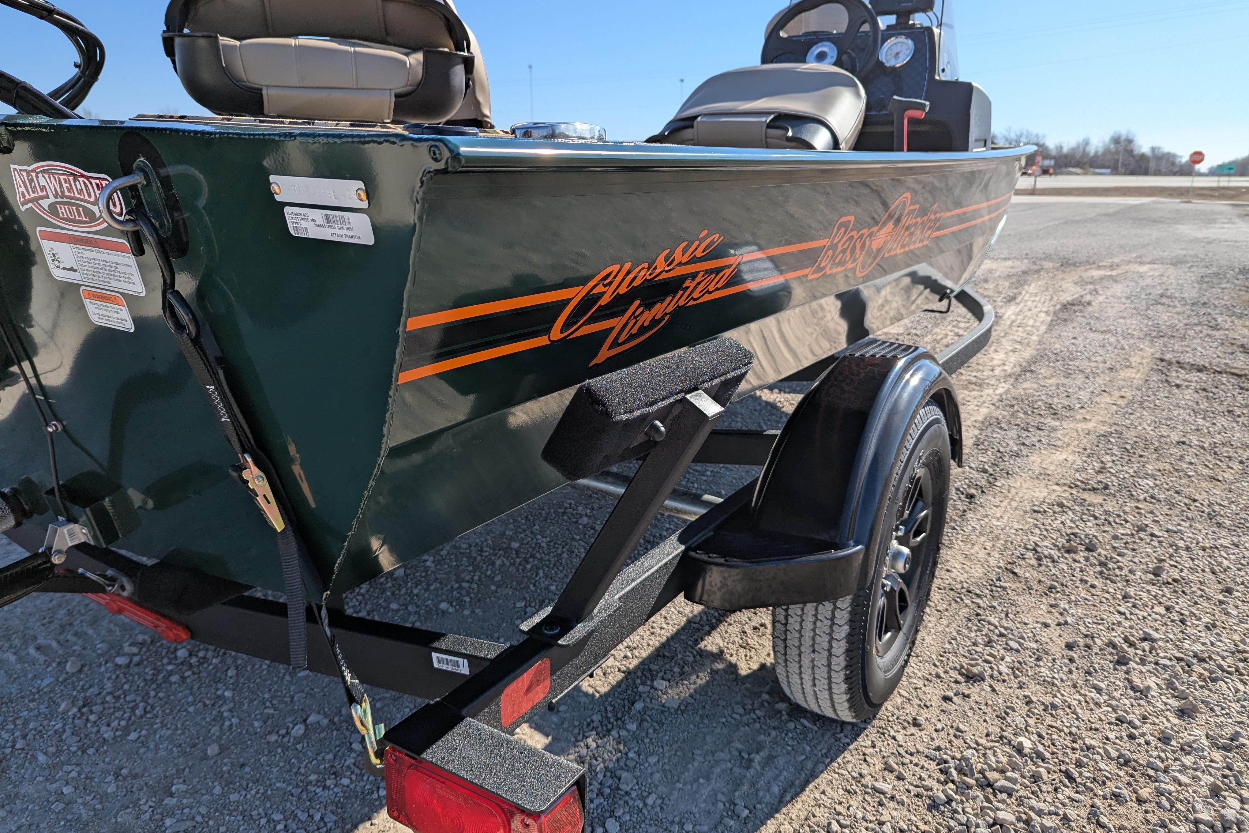 2025 Tracker Bass Tracker Classic Limited boat on trailer, side view.