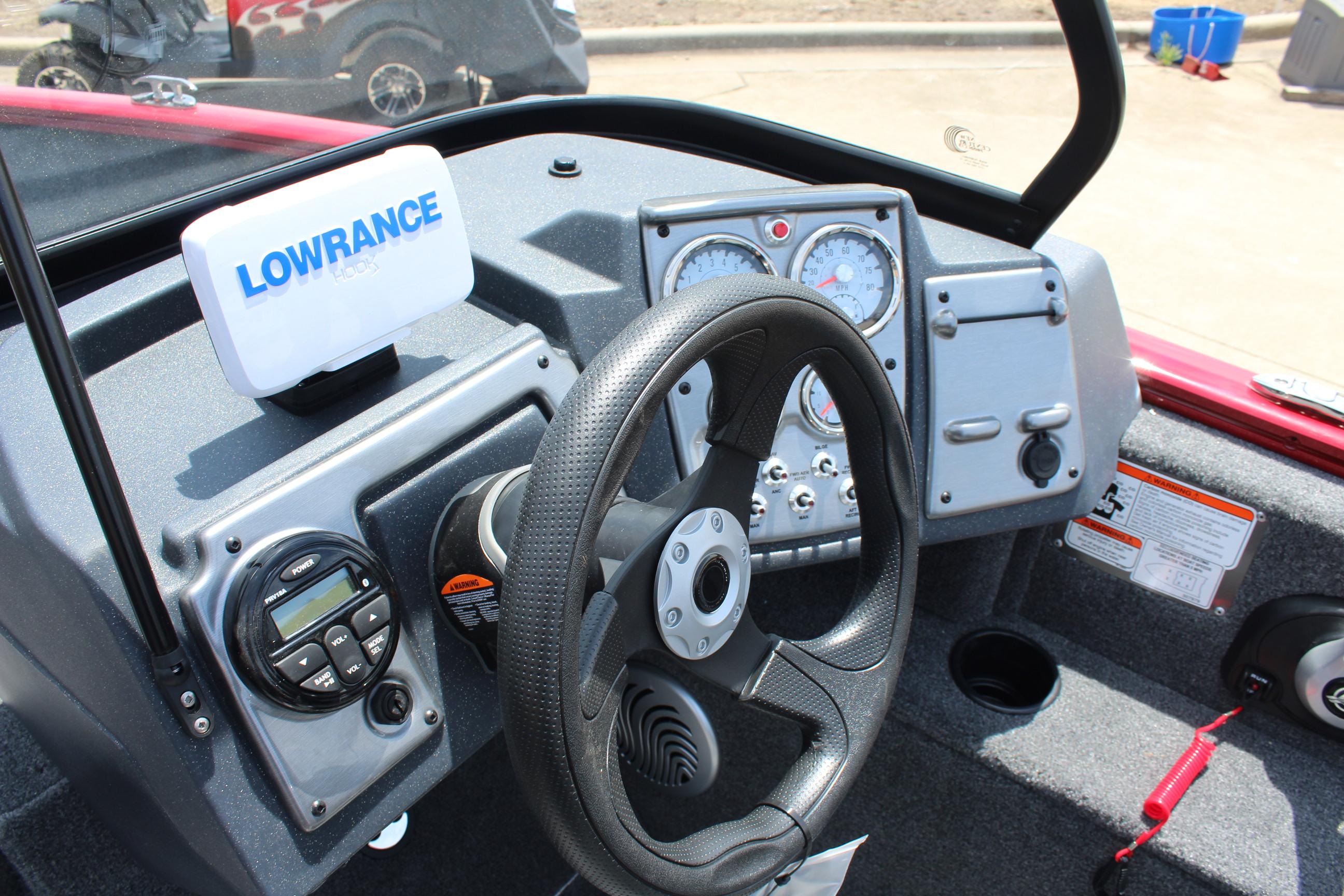 2025 Tracker Pro Guide V-175 Combo dashboard with Lowrance system and steering wheel.