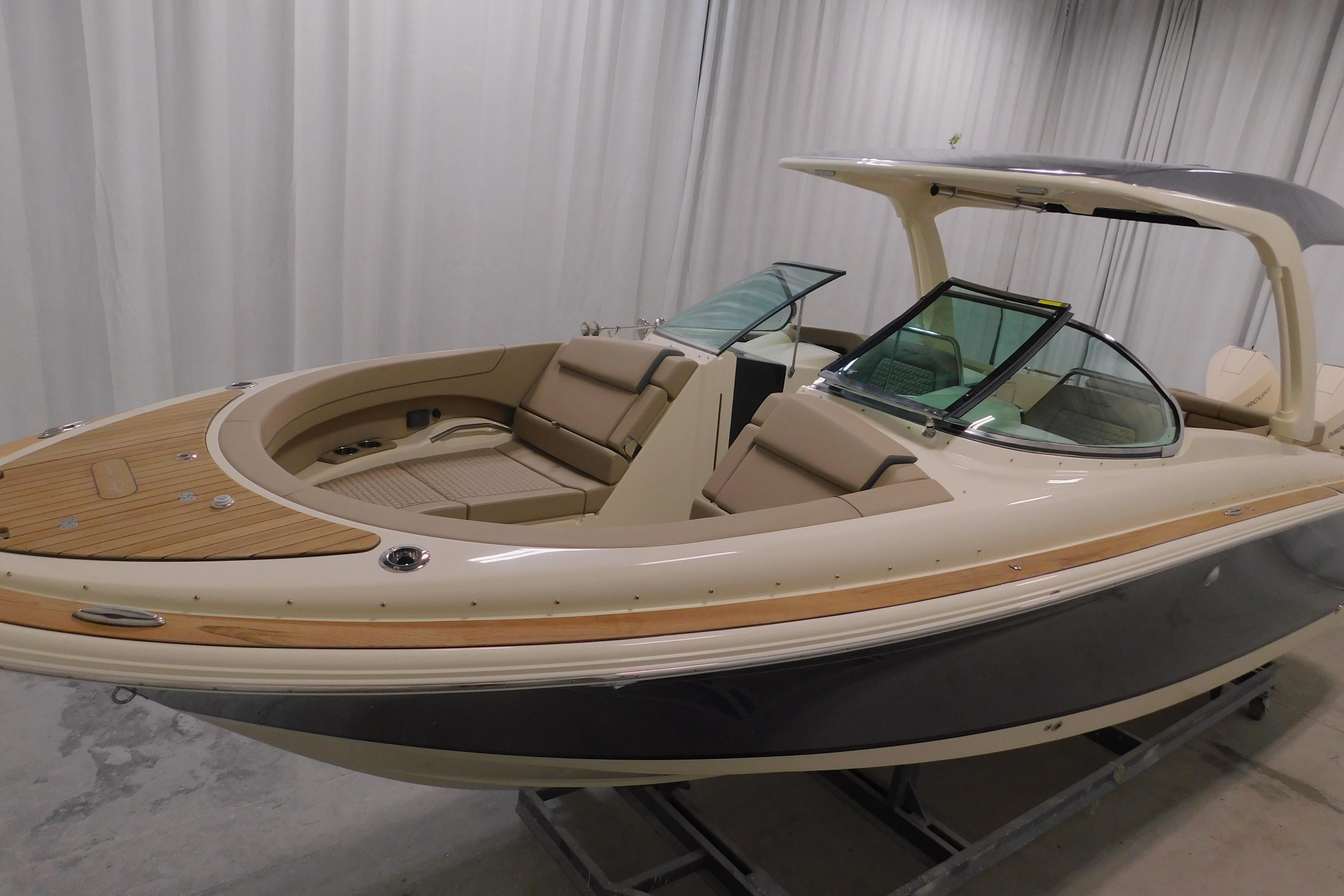 2024 Chris-Craft Launch 31 GT boat with elegant design and luxurious seating.