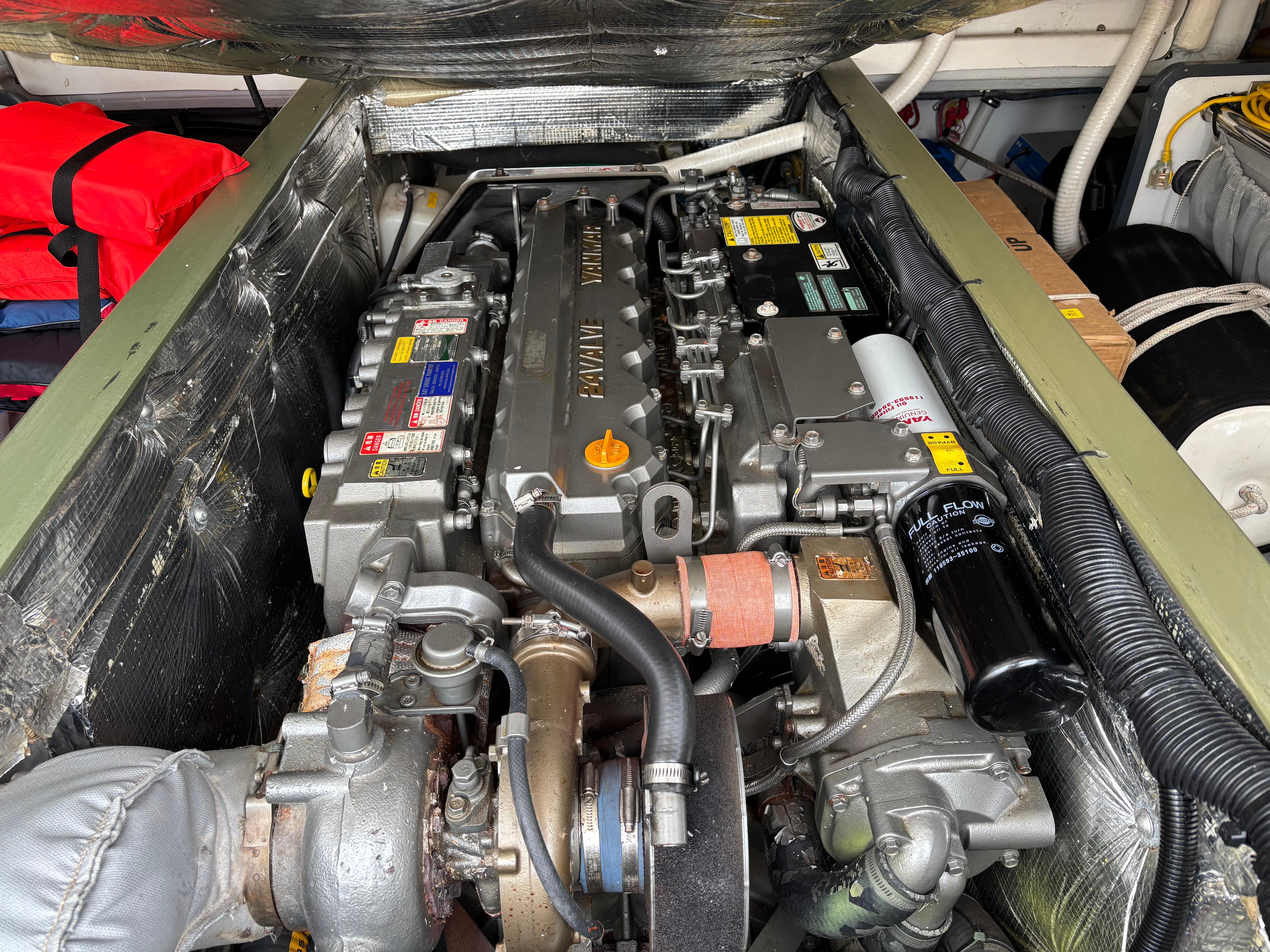 MJM-34z Express HT 2006-Zest MD-US-Engine compartment of a 2006 MJM 34z Express HT boat, showcasing detailed machinery.-9817750 | Thumbnail